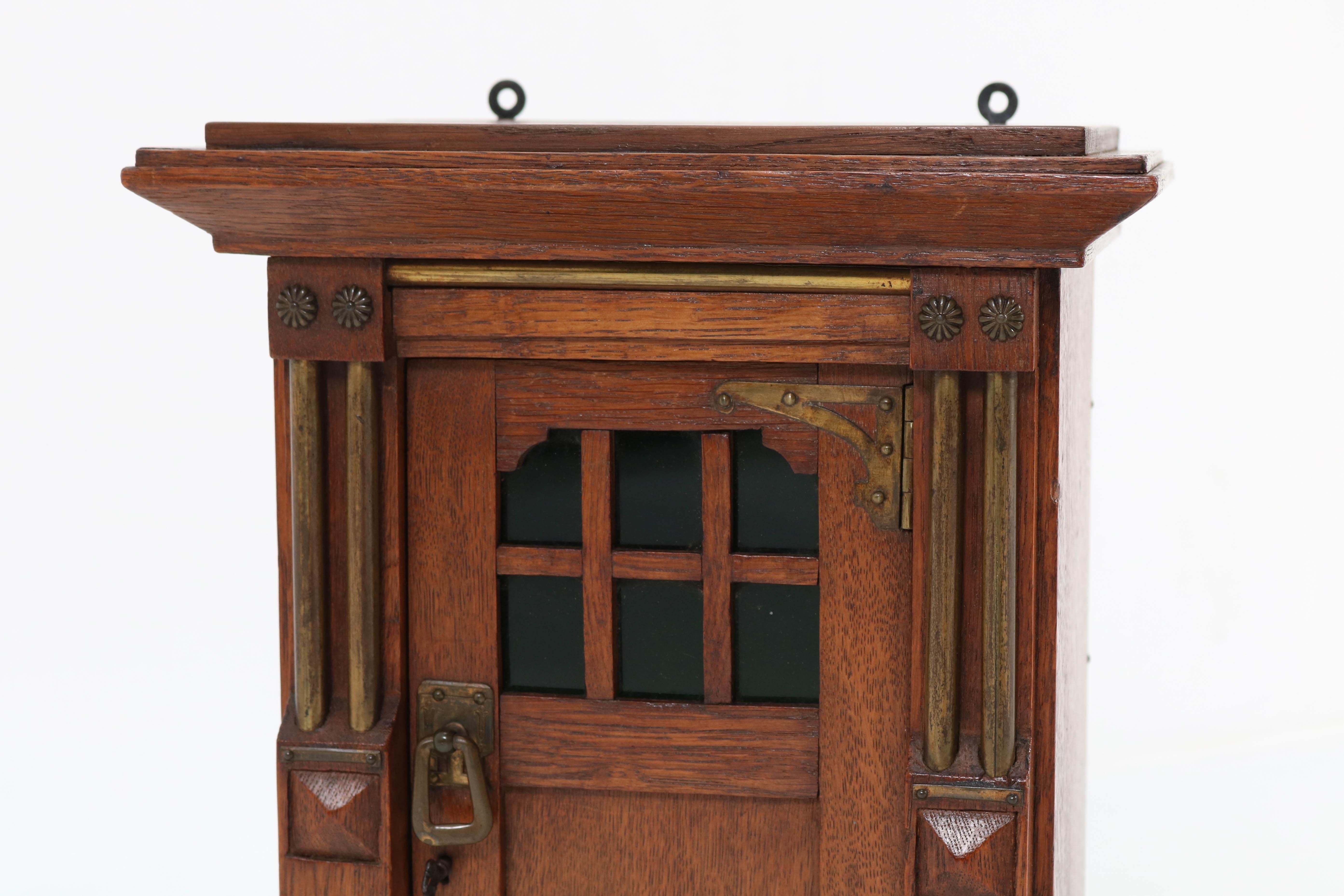 Early 20th Century Oak Arts & Crafts Art Nouveau Miniature Wall Cabinet by N. v/d Pol, 1917