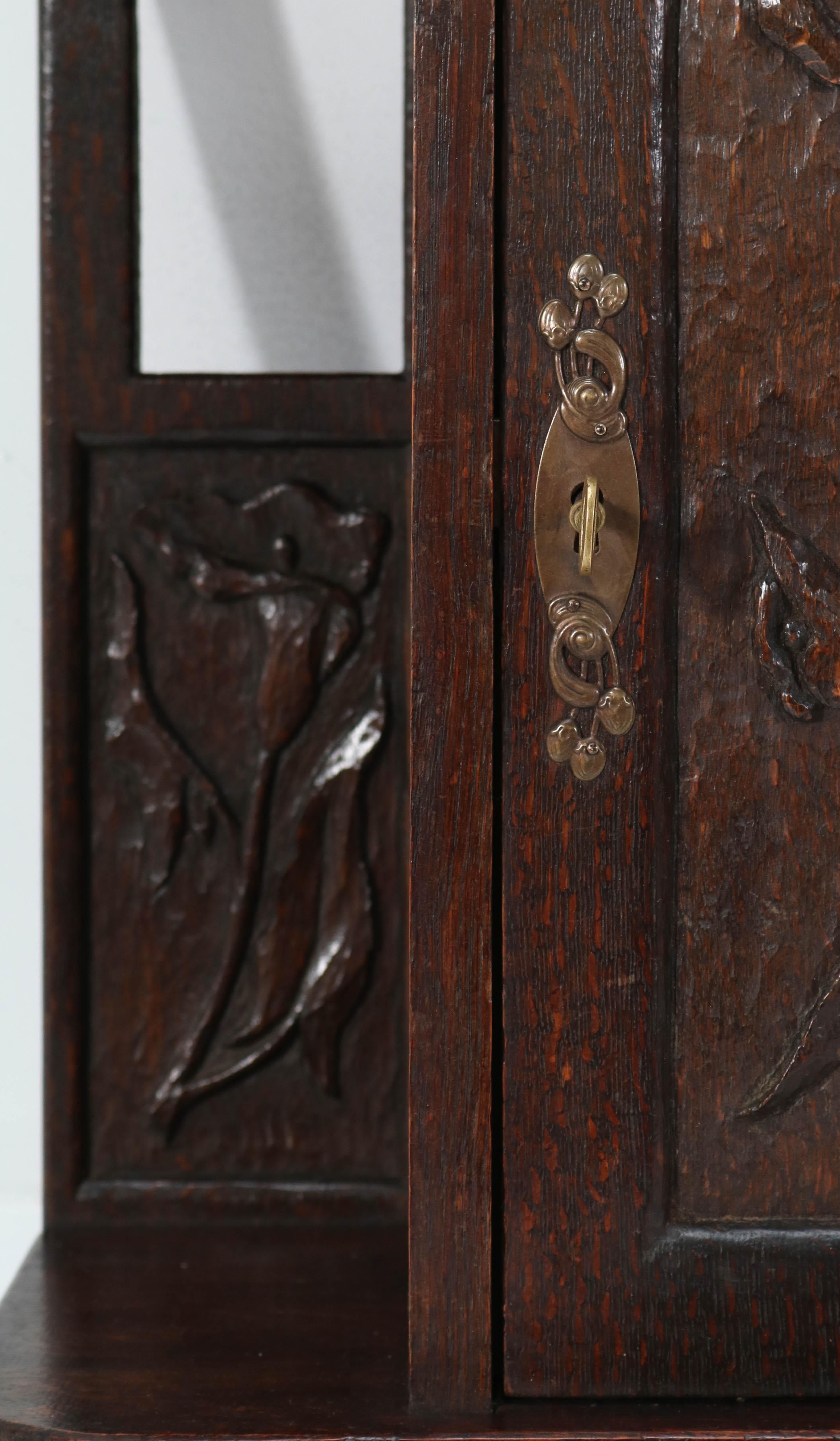 Early 20th Century Oak Arts & Crafts Art Nouveau Wall Cabinet with Calla Lilies, 1900s For Sale
