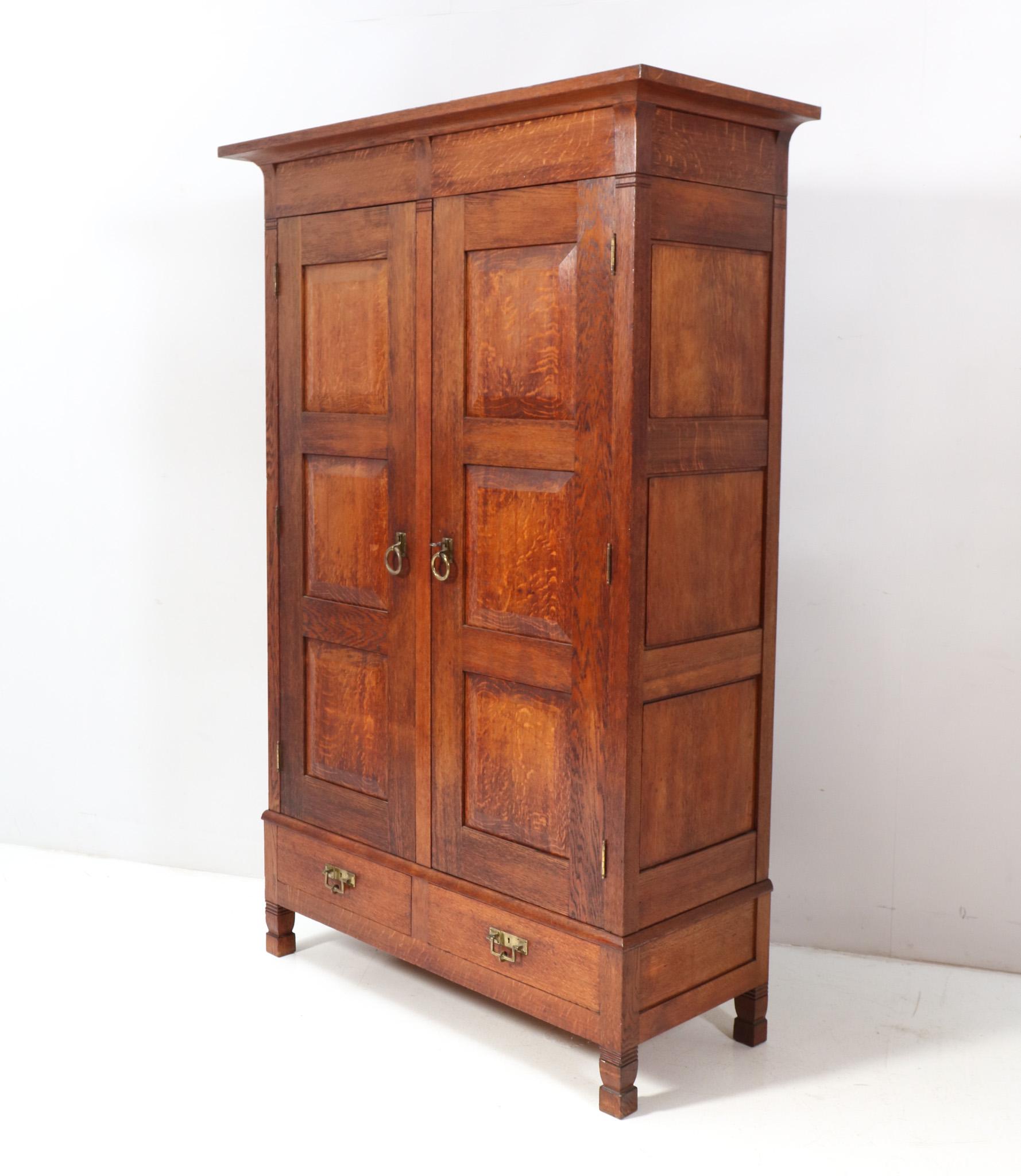 Dutch Oak Arts & Crafts Rationalist Armoire or Wardrobe by Willem Penaat, 1900s For Sale