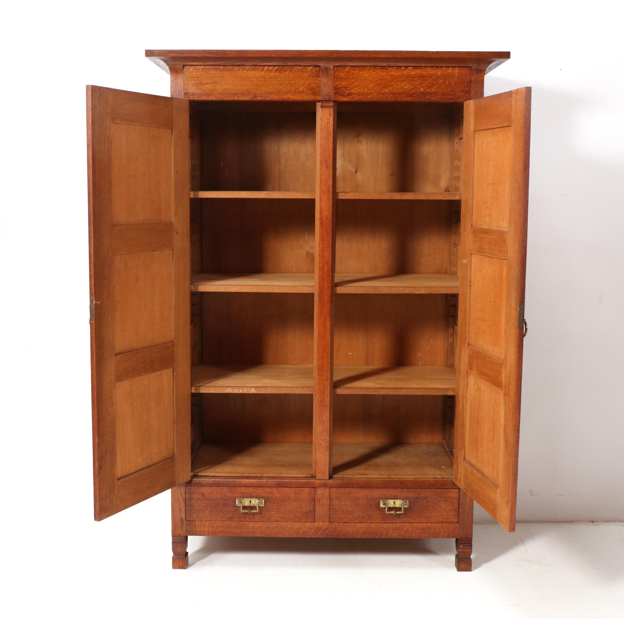 Early 20th Century Oak Arts & Crafts Rationalist Armoire or Wardrobe by Willem Penaat, 1900s For Sale
