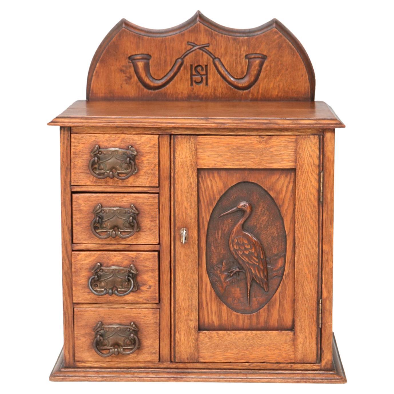 Oak Arts & Crafts Wall Cabinet with Hand-Carved Stork, 1900s For Sale