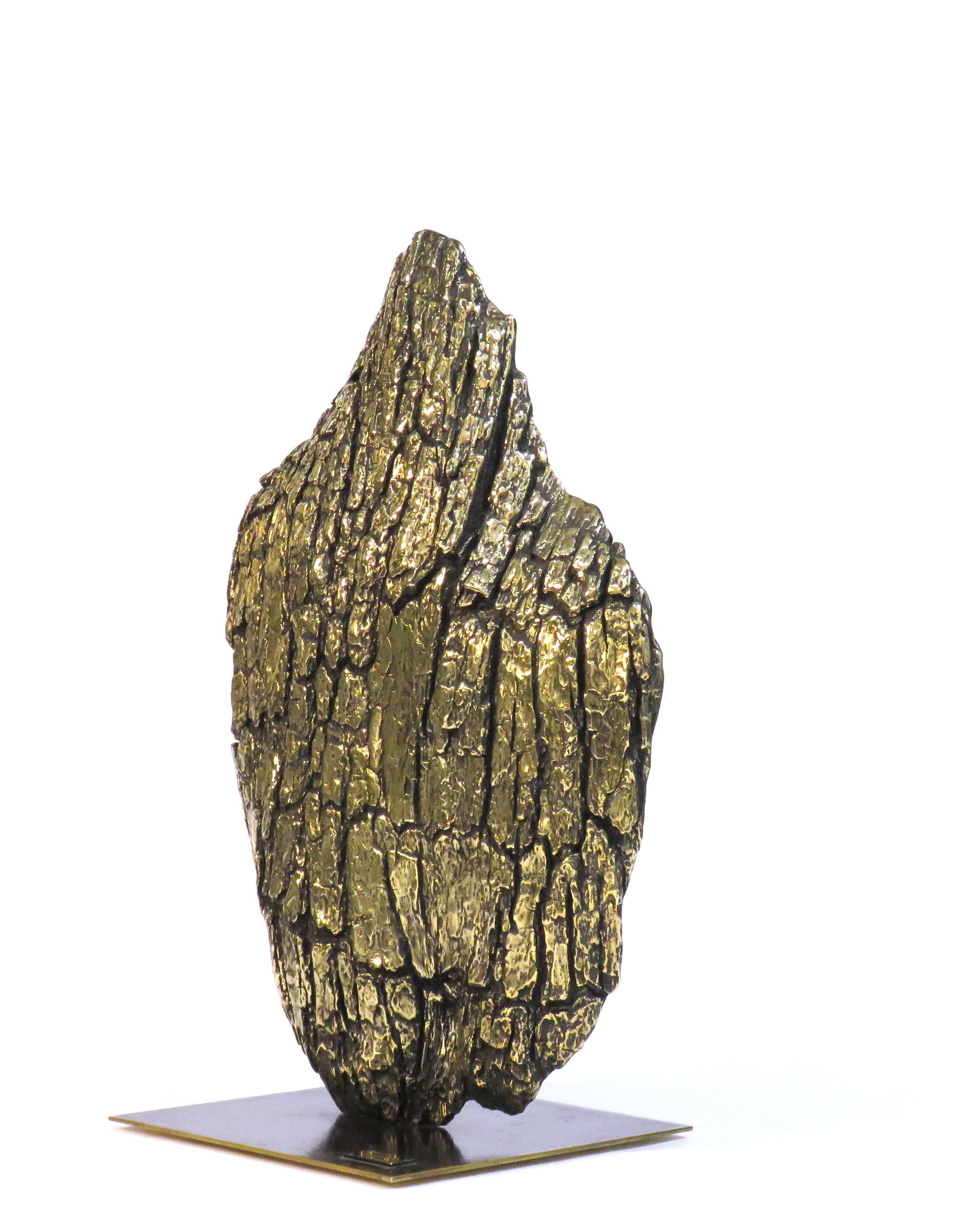 Bark-Tischskulptur aus Eichenholz von Lionel Hamon
Abmessungen: Ø 35 x H 60 cm. 
MATERIALIEN: Messing.
Ausführung: Leichte Patina.

Erhältlich in drei Ausführungen: schwarz patiniert, hell patiniert und vergoldet. Preise können abweichen. Bitte