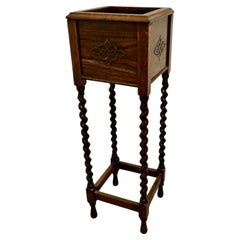 Oak Barley Twist Planter Jardinière  The planter is made in  Oak