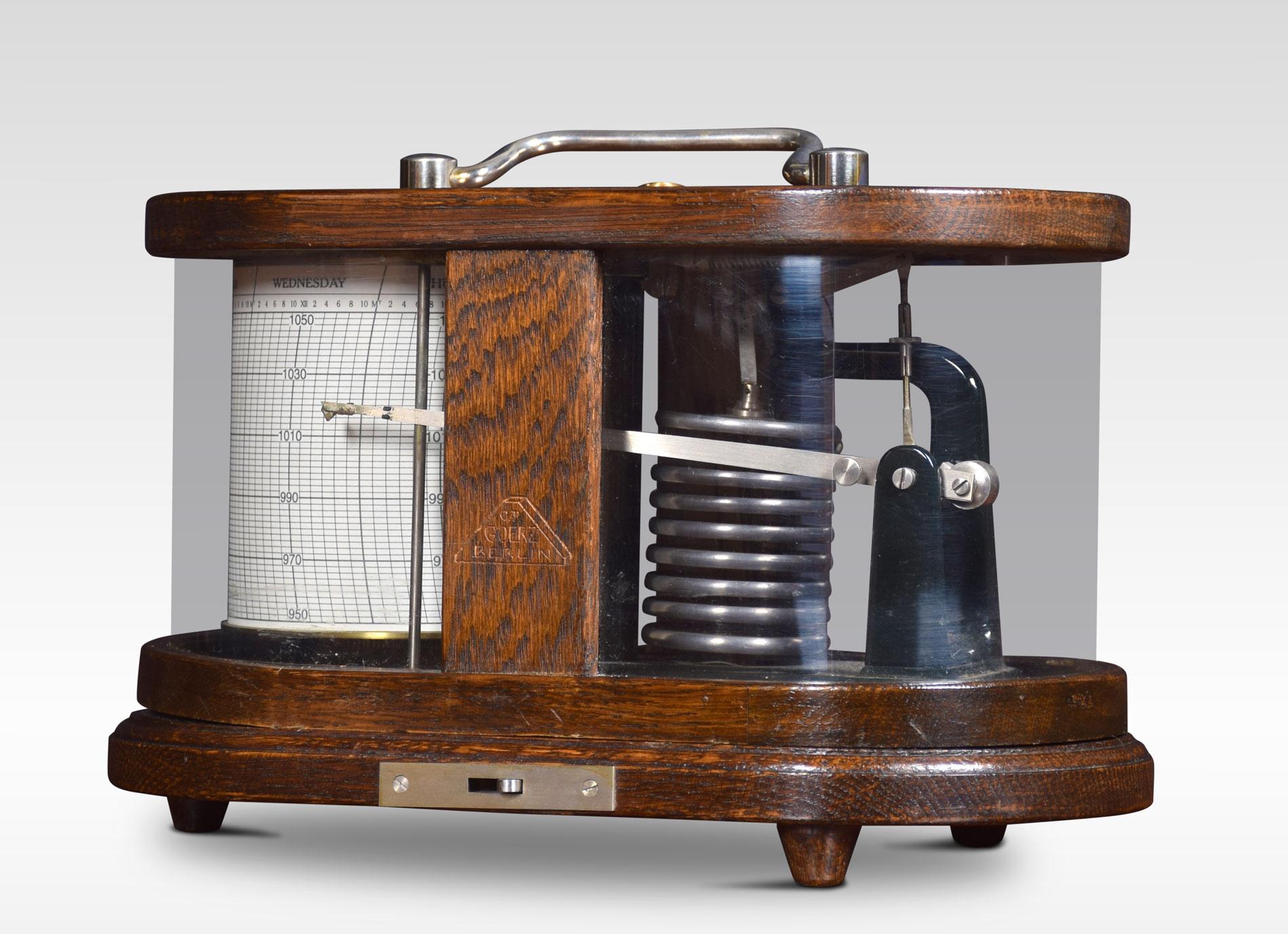 Art Deco barograph by C P Goerz. The oak and plated metal Barograph encase with rounded ends. The mechanical eight-day movement is housed in the drum, fitted with a seven-day chart which covers one full rotation of the drum. The ink trace, or