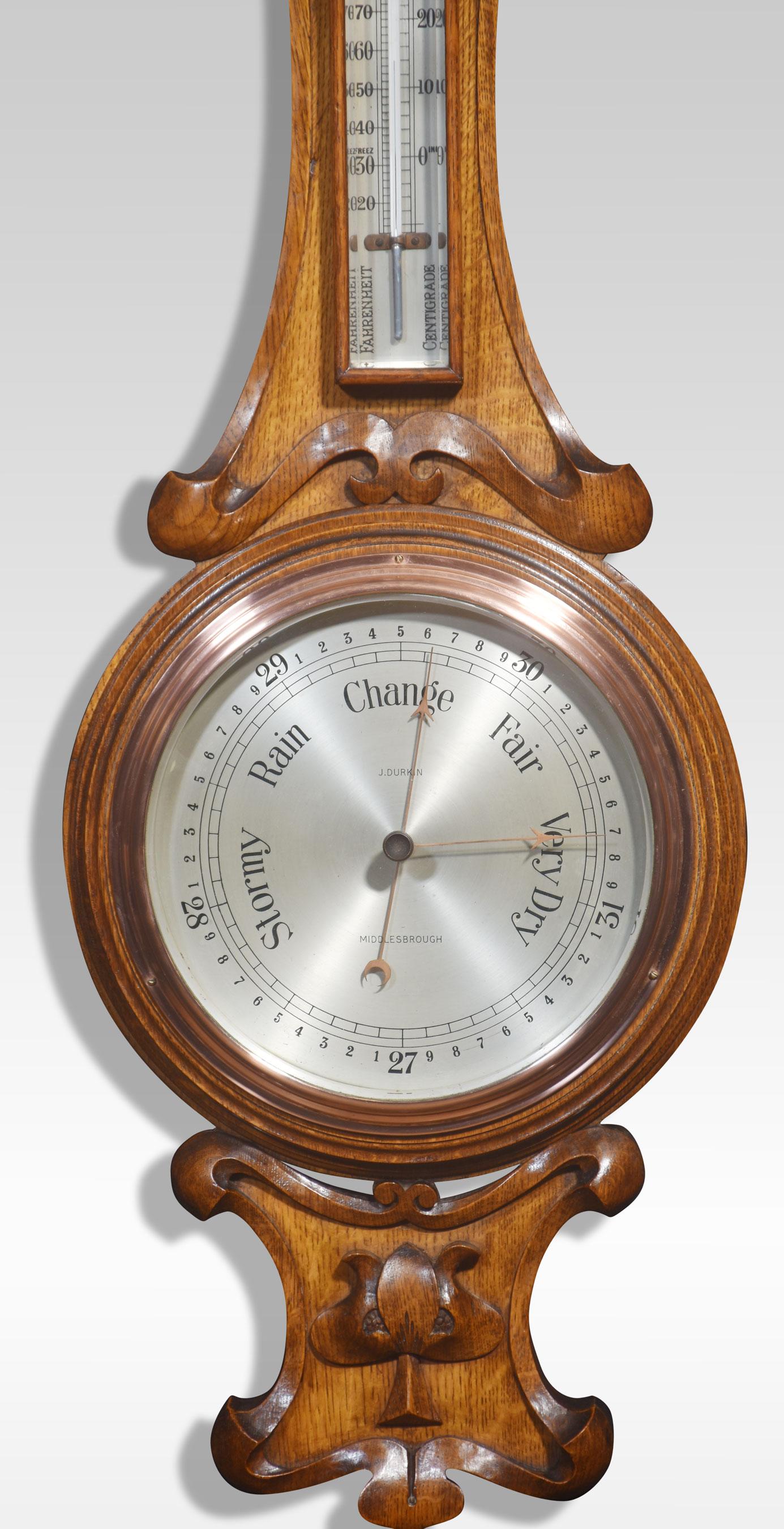 Carved oak barometer, the shaped carved oak frame with rectangular thermometer above the silvered dial inscribed J. Durkin, Middlesbrough, encased in copper frame.
Dimensions
Height 33 Inches
Width 11 Inches
Depth 3.5 Inches