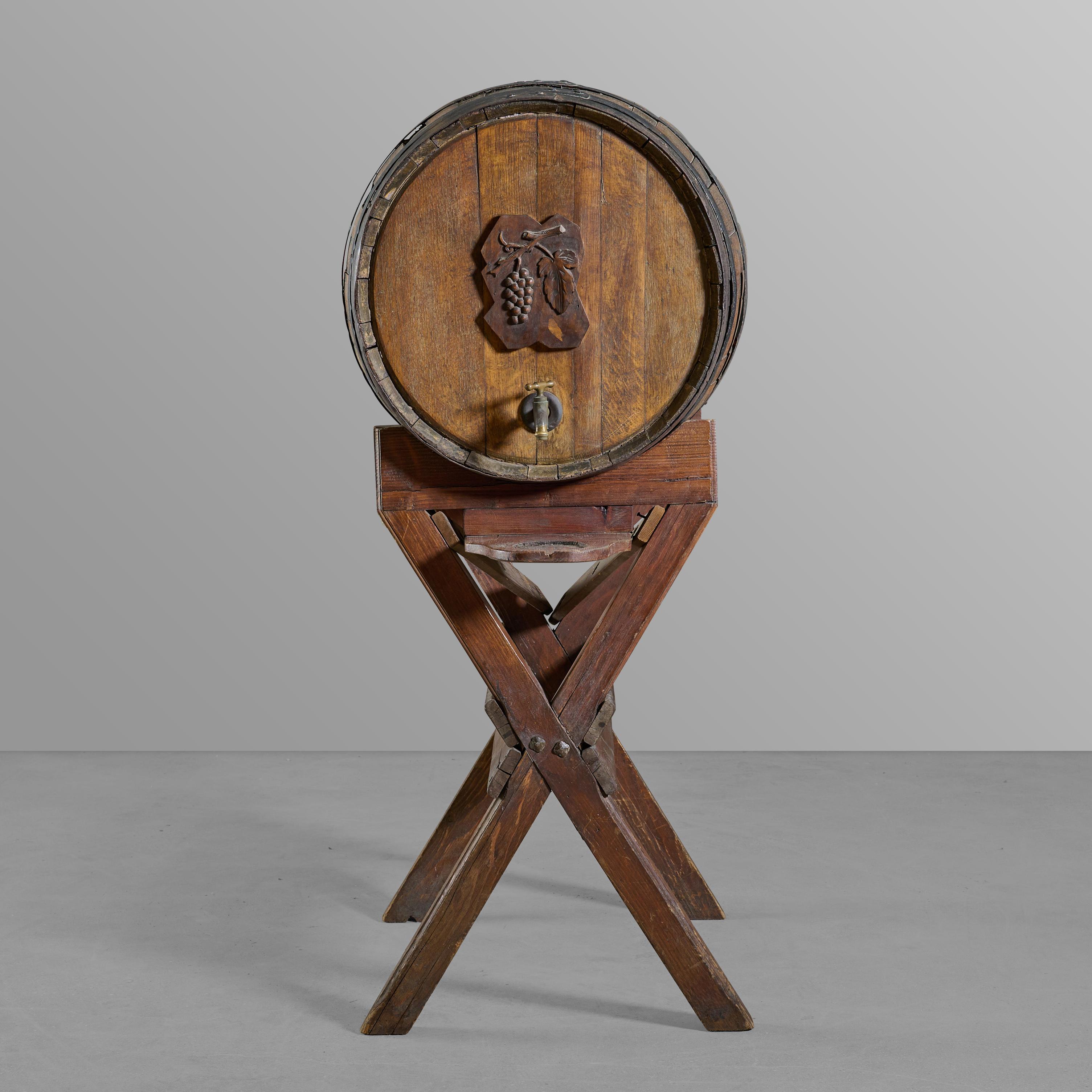 Oak barrel with pine base, spigot, and adapted mechanicals.