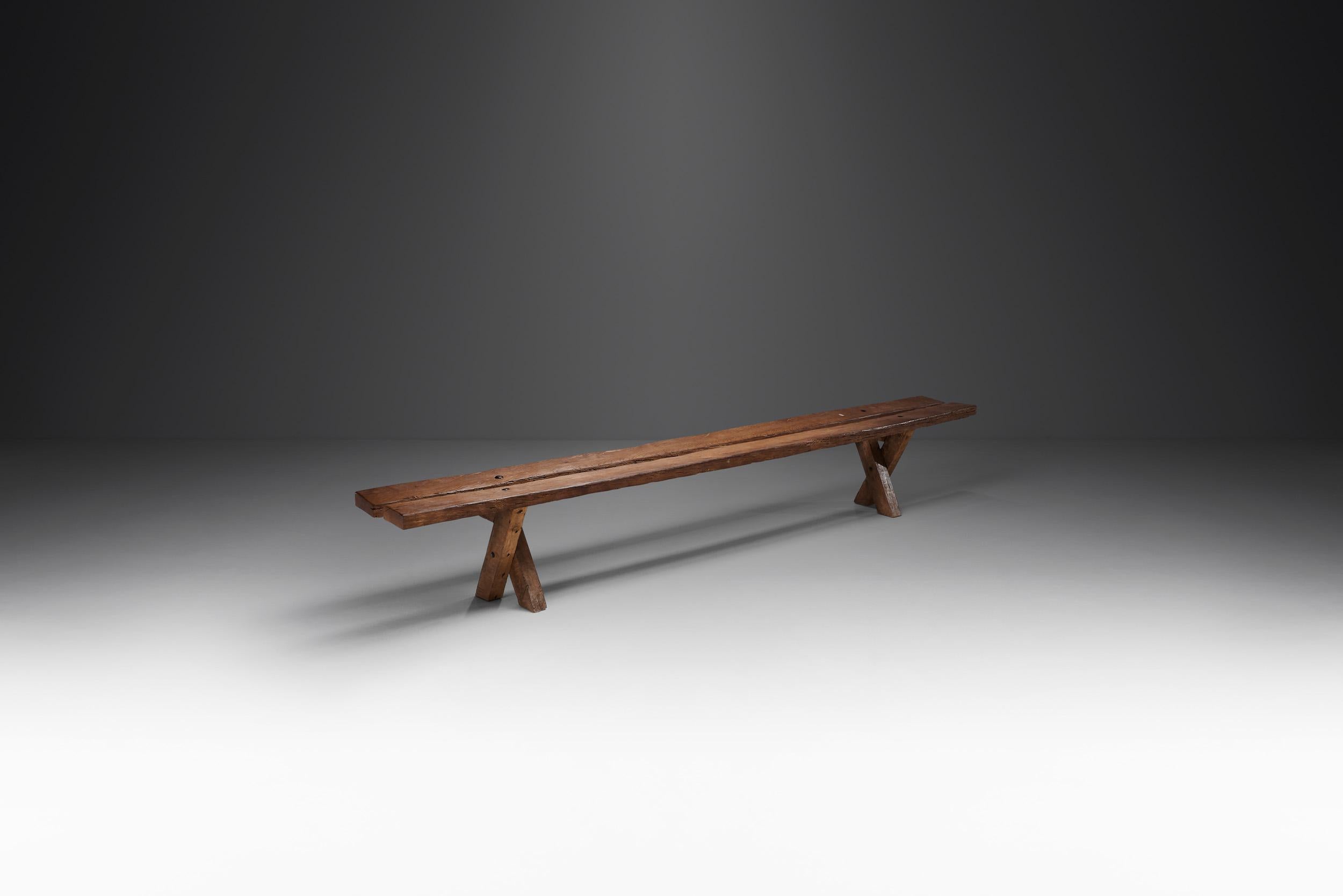 Like the bench with backrests, this simple bench was created by Jean and Sébastien Touret for a religious community of Loir et Cher -a department in the Centre-Val de Loire region of France - from oak of the property. This also means that these