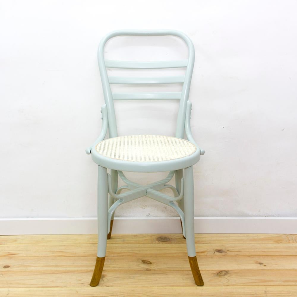 Art Nouveau Oak bentwood chair manufactured in Spain at the beginning of the 20th century.
The chair was completely restored and painted in inverse dip-dye in aquamarine color.
Woven cane seat also restored.