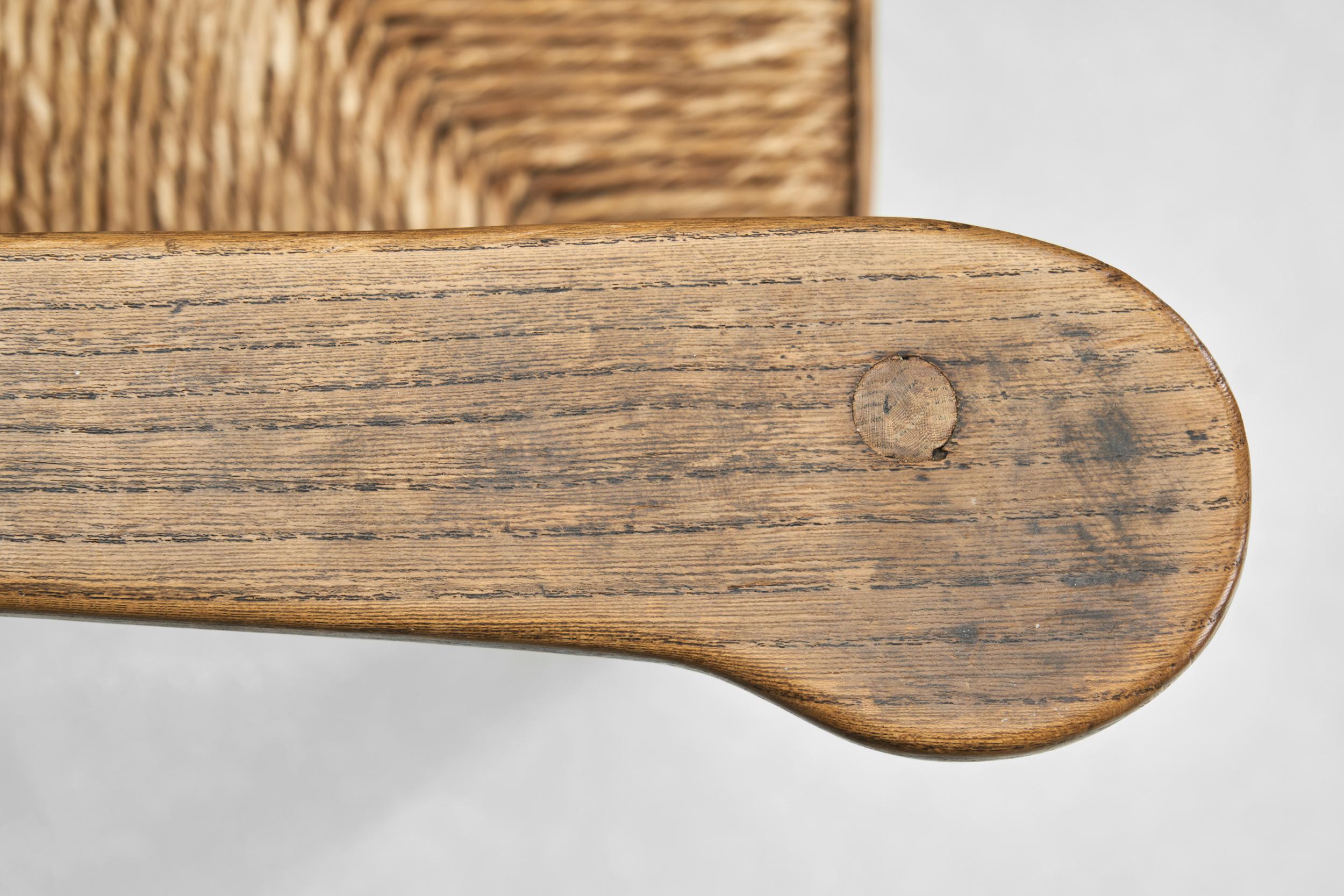 Poltrona in Oak con seduta in vimini, Paesi Bassi, anni '30 in vendita 7