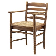 Sillón de bobina de roble con asiento de mimbre, Países Bajos Años 30