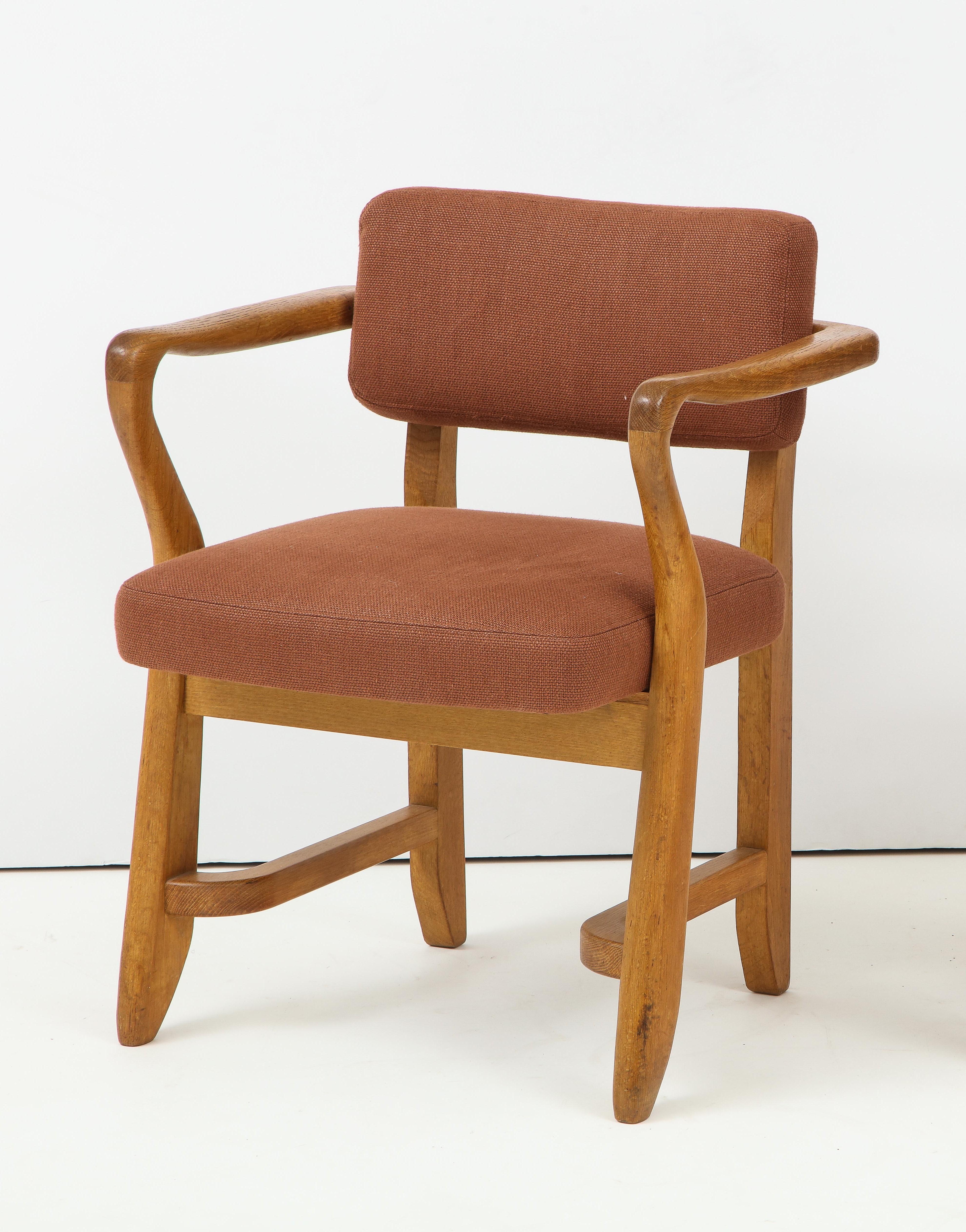 Exceptional mid-century oak armchair designed by Guillerme et Chambron, France, c. 1950s. Robert Guillerme and Jacques Chambron, the acclaimed duo behind Votre Maison, are widely celebrated for producing quality oak furniture designs that are at