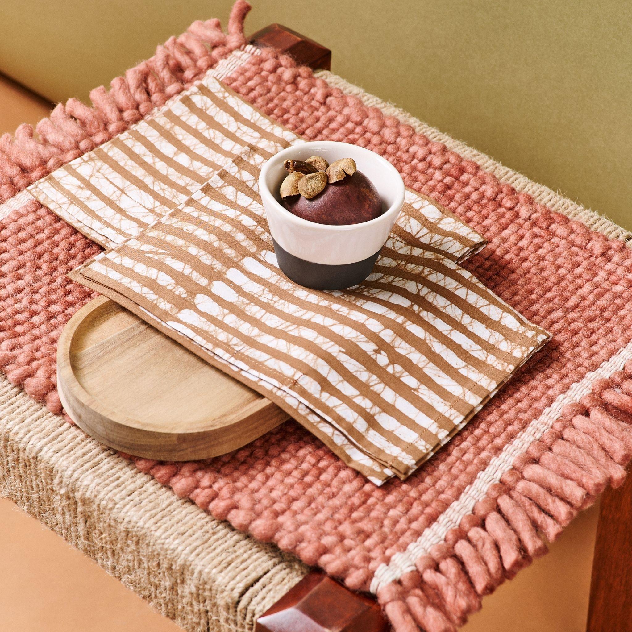 Oak Brown table napkin is a unique modern artisanal napkin. Created artistically and ethically by artisans in India using wax block print technique, using only pure natural dyes. It is a pure statement piece that adds modern and timeless quality as 