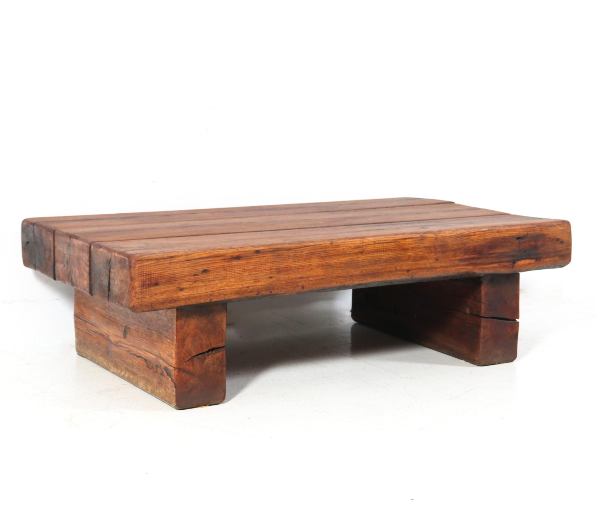 Stunning Mid-Century Modern Brutalist Rustic coffee table.
Striking French design from the 1960s.
Solid oak base with original solid oak top.
This wonderful Mid-Century Modern Brutalist Rustic coffee table is in very good condition with minor wear