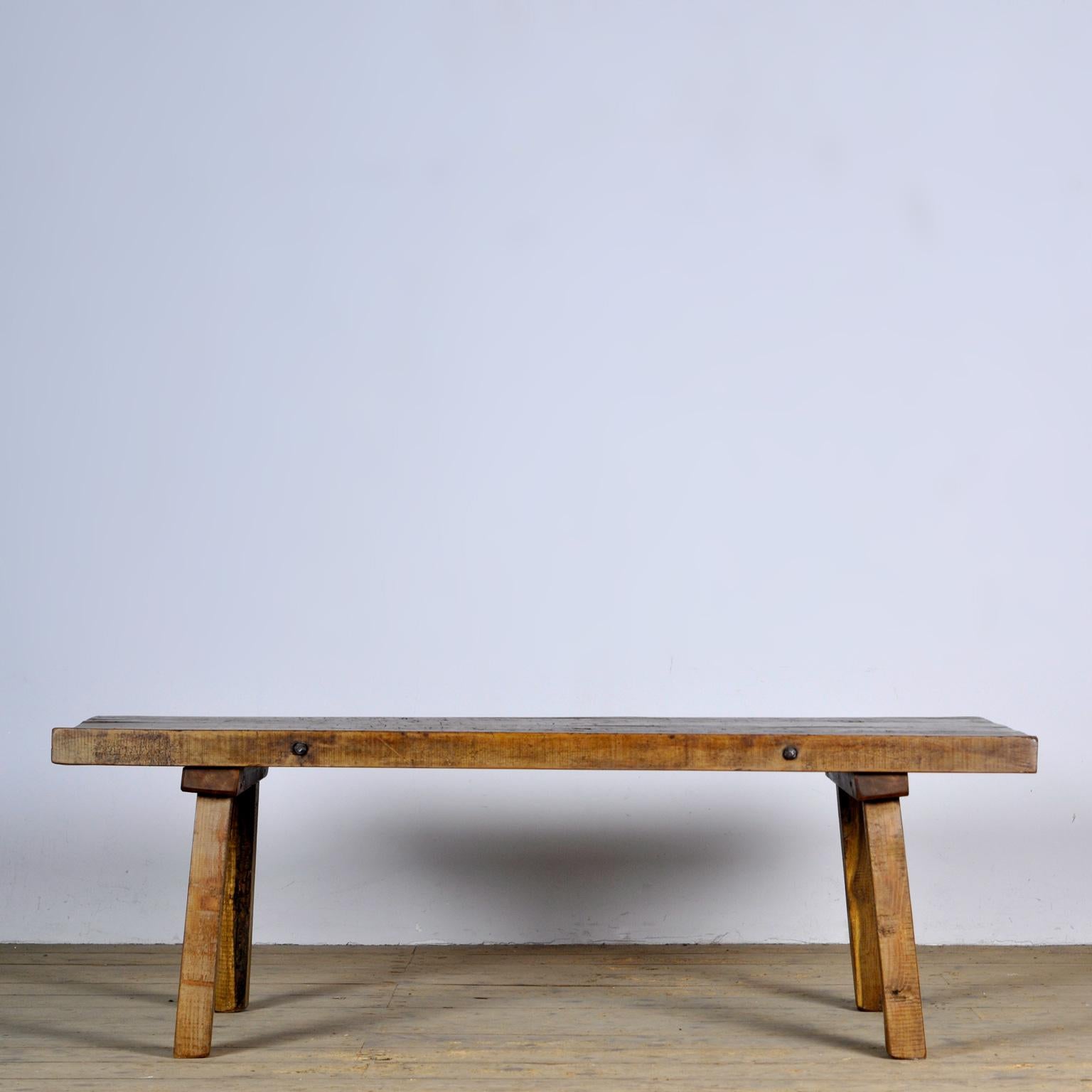 This oak butcher’s farm table was produced in hungary around the 1920s. With an oak top of 5 cm thick. The legs are shortened to the ideal height for a coffee table or bench. Treated for woodworm.