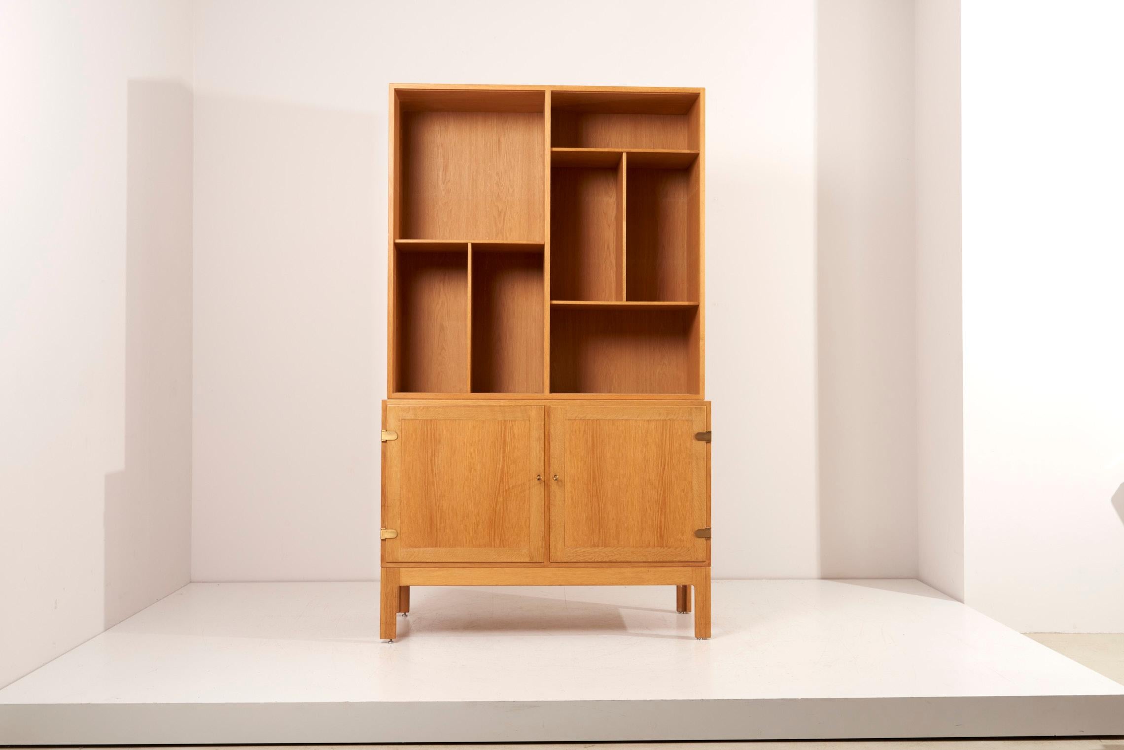 Shelving and storage cabinet in oak by Borge Mogensen.