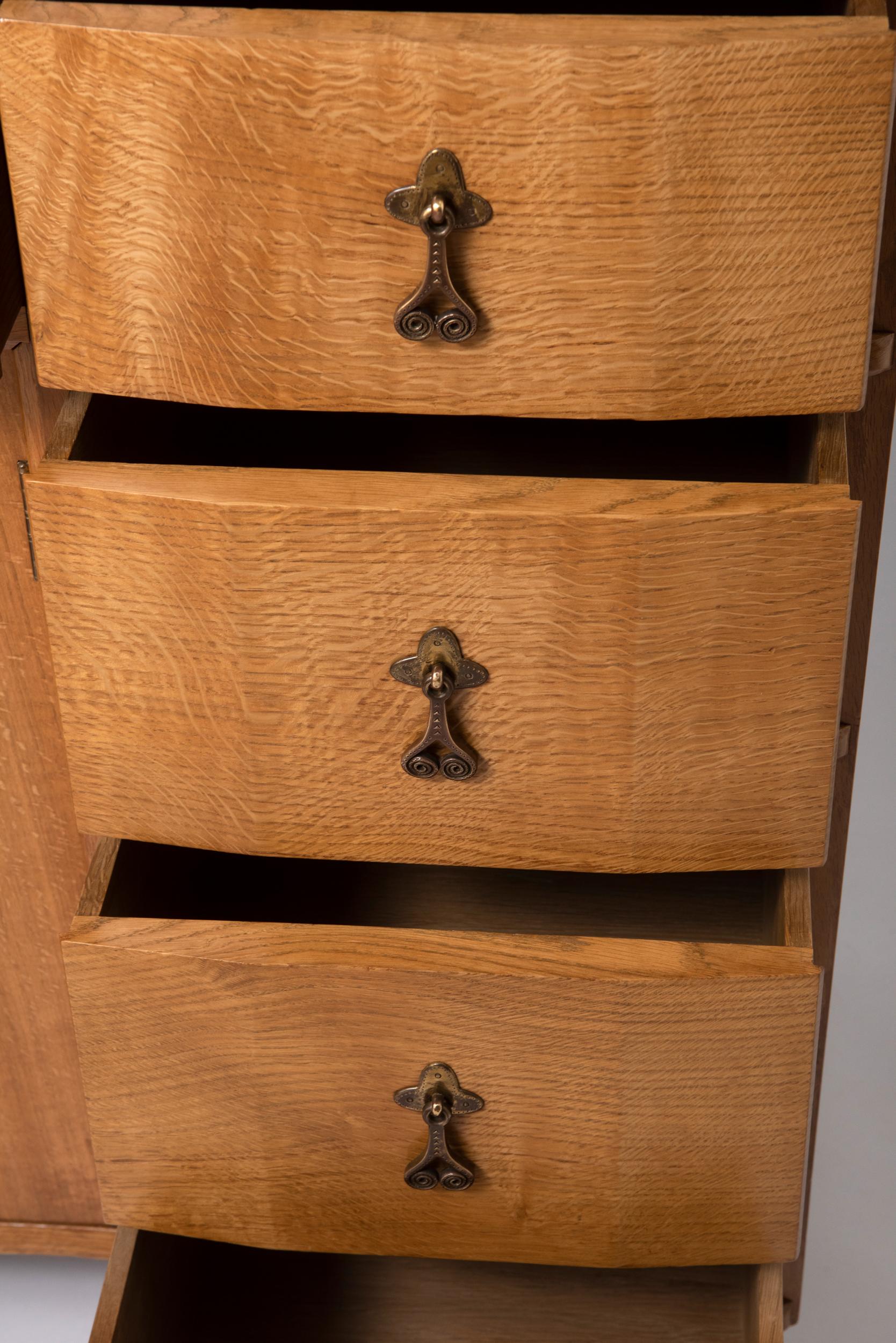 British Oak Cabinet by Peter Waals with Wrought Iron Scroll Handles, England, circa 1930 For Sale