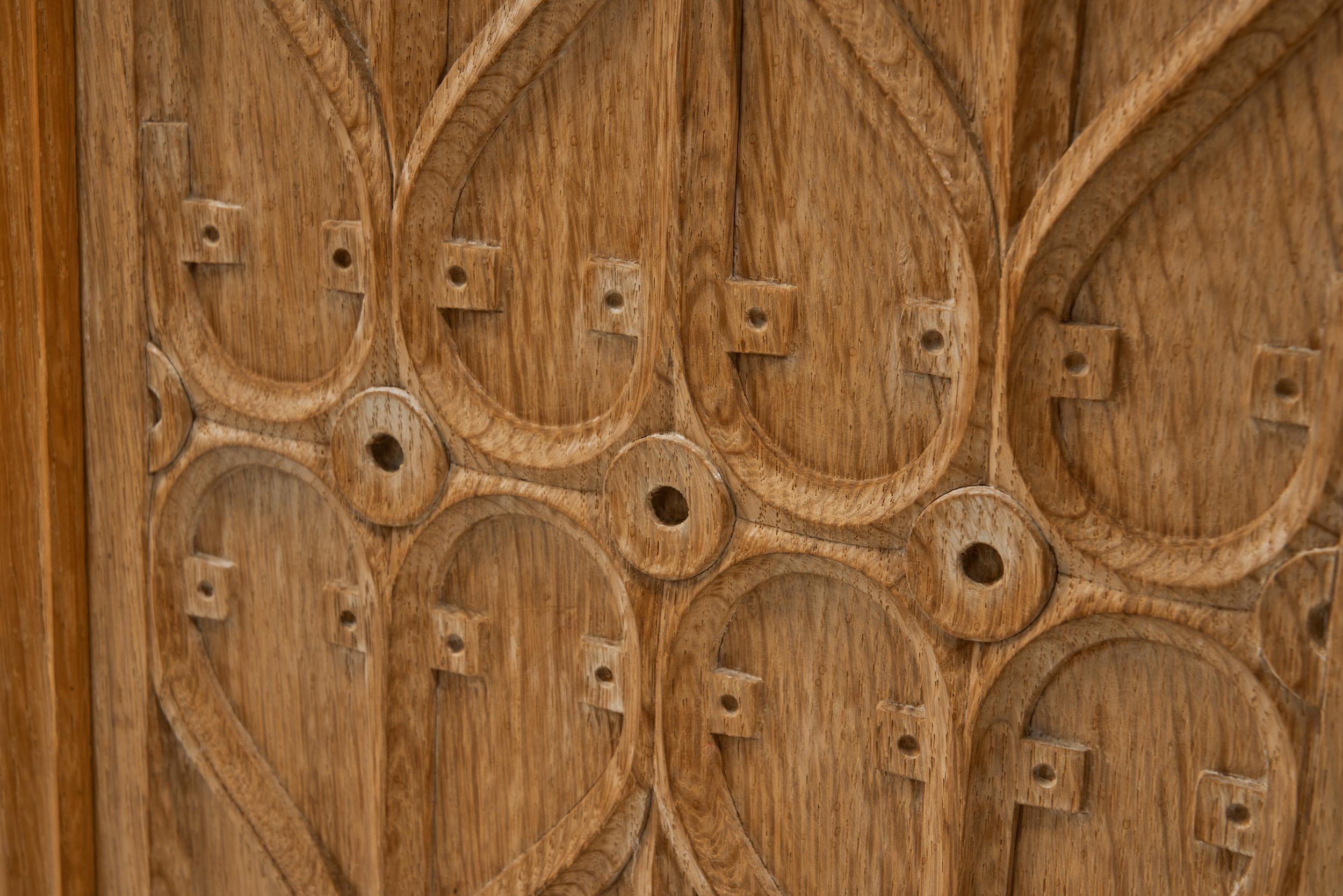 Oak Cabinet with Carved Motifs by Henning Kjærnulf, Denmark Mid 20th Century For Sale 6