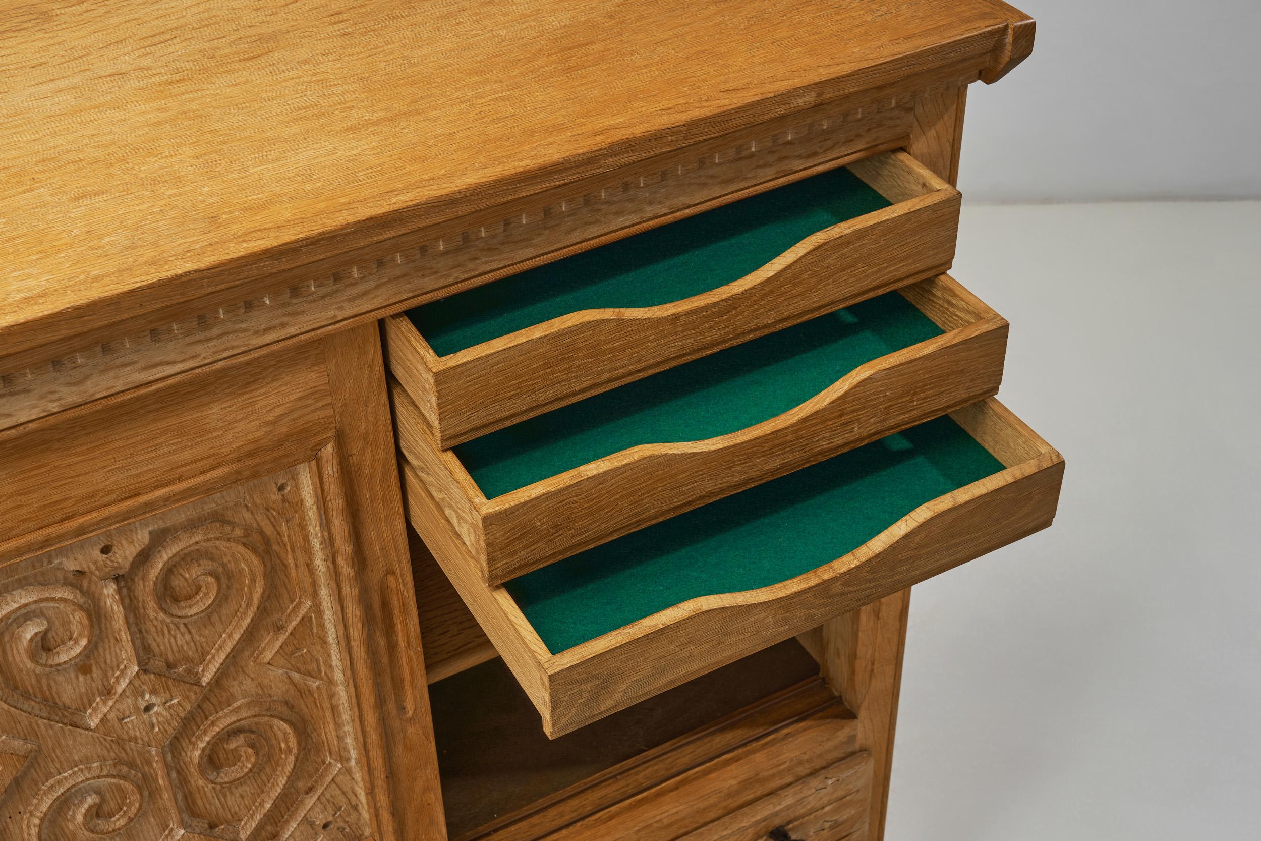 Oak Cabinet with Carved Motifs by Henning Kjærnulf, Denmark Mid 20th Century For Sale 7
