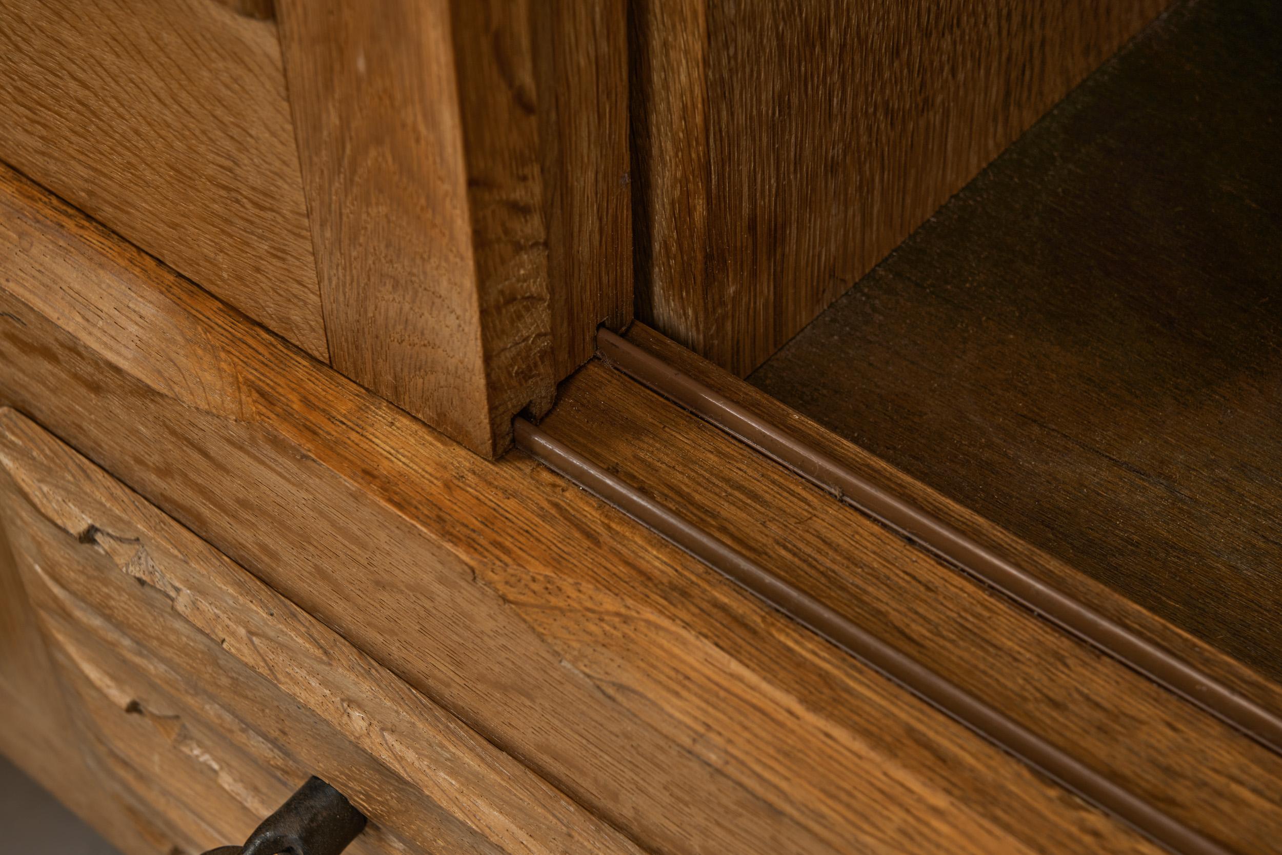 Oak Cabinet with Carved Motifs by Henning Kjærnulf, Denmark Mid 20th Century For Sale 8