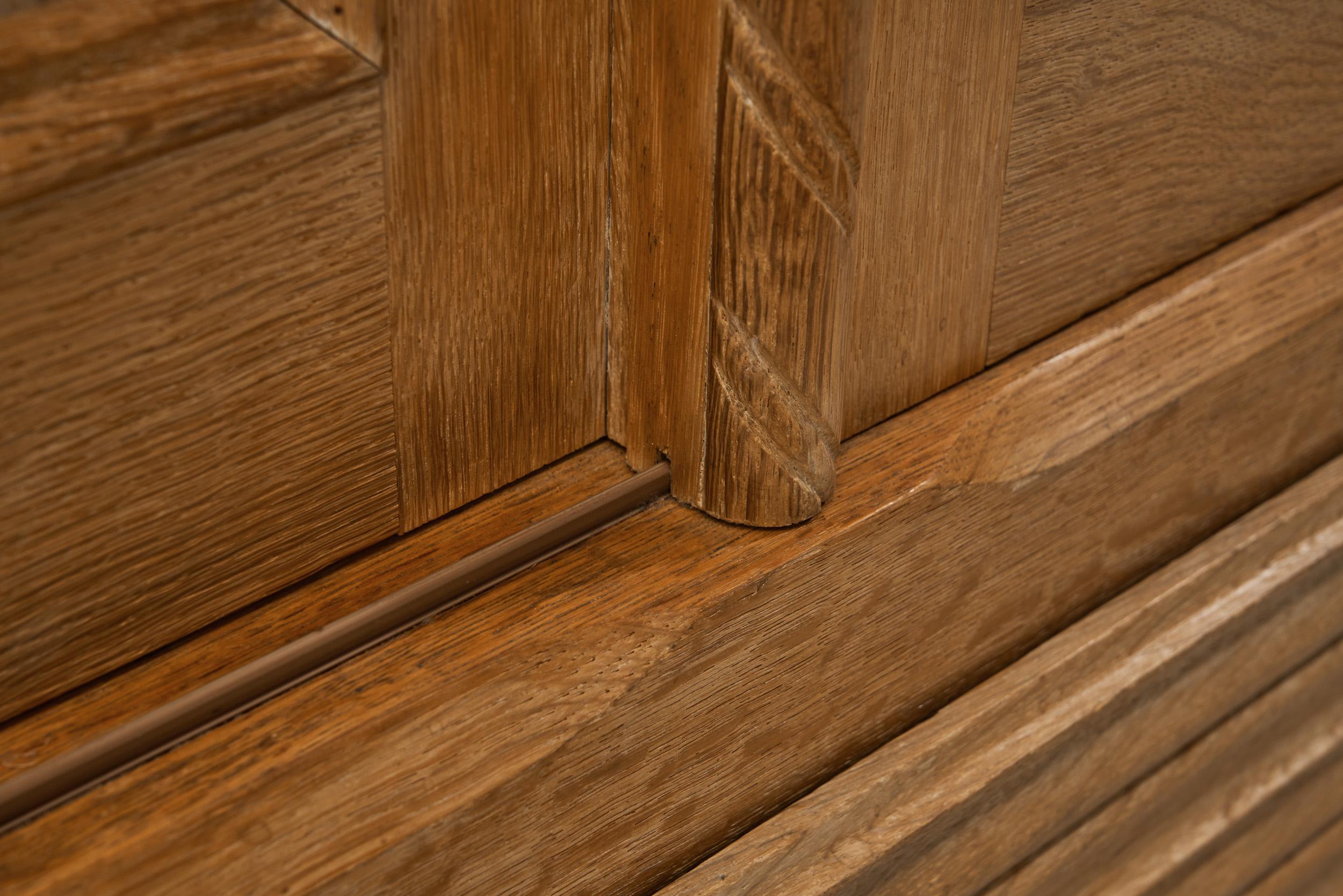 Oak Cabinet with Carved Motifs by Henning Kjærnulf, Denmark Mid 20th Century For Sale 9