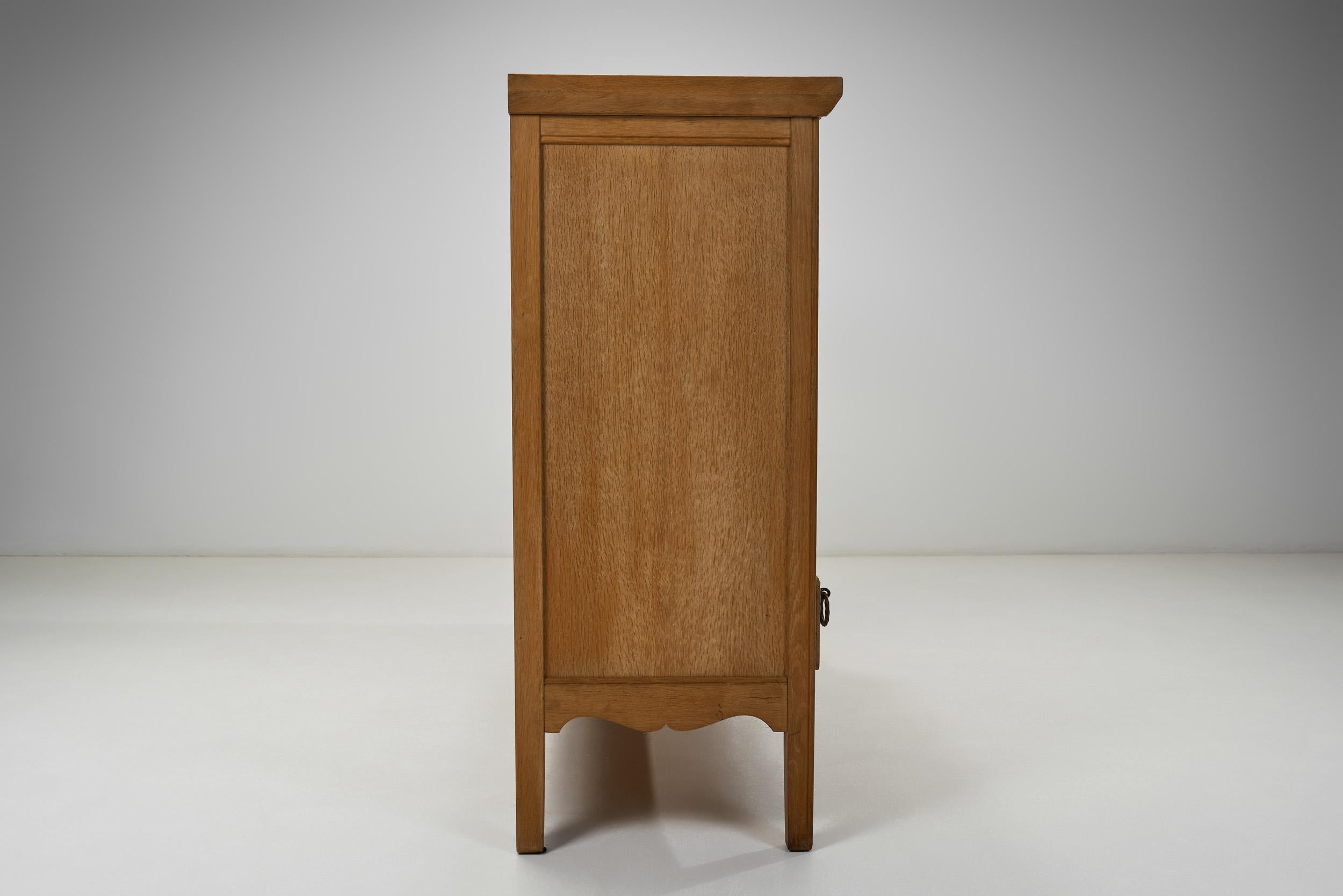 Oak Cabinet with Carved Motifs by Henning Kjærnulf, Denmark Mid 20th Century For Sale 12