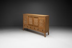 Oak Cabinet with Carved Motifs by Henning Kjærnulf, Denmark Mid 20th Century