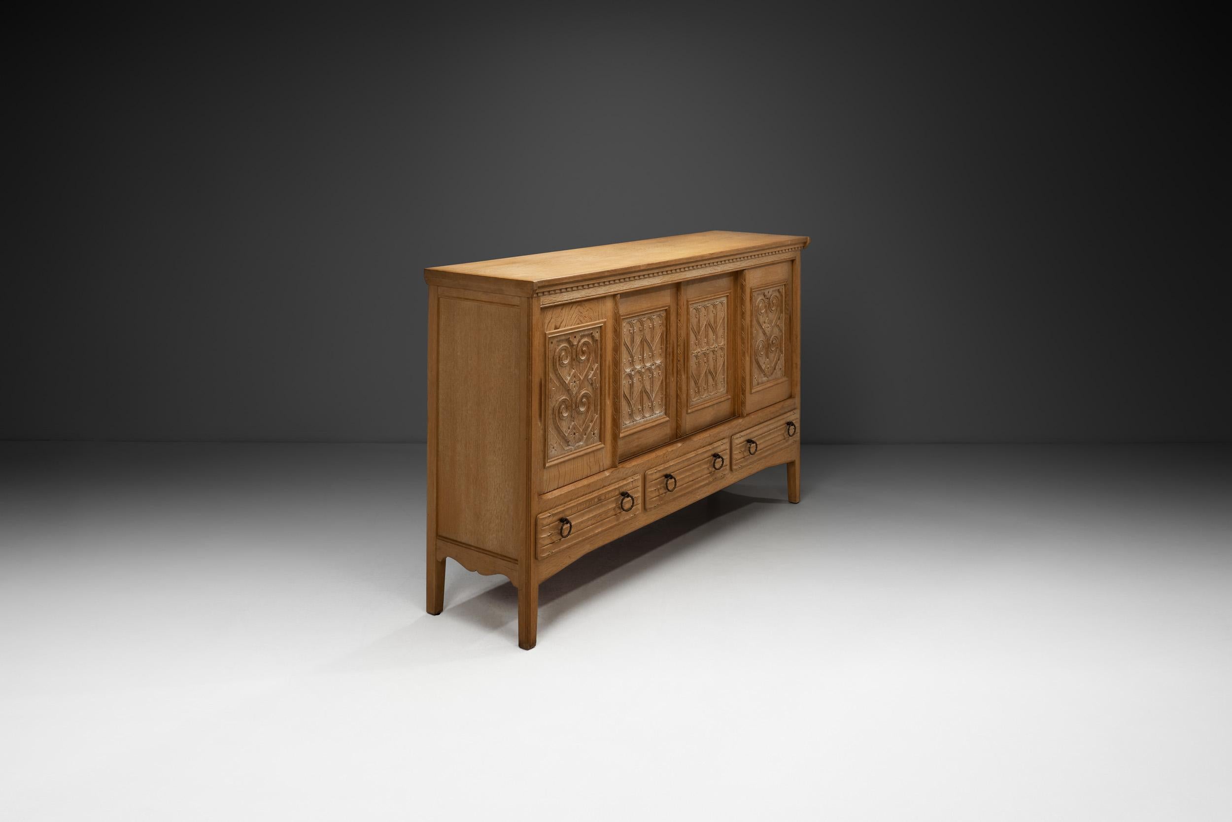 Oak Cabinet with Carved Motifs by Henning Kjærnulf, Denmark Mid 20th Century For Sale 1