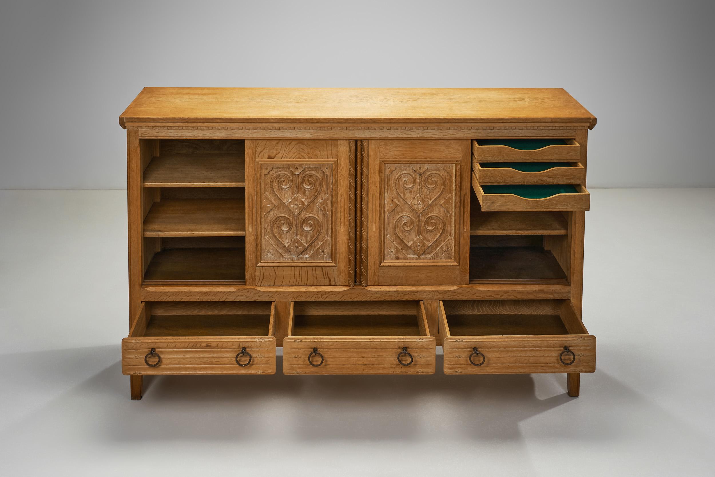 Oak Cabinet with Carved Motifs by Henning Kjærnulf, Denmark Mid 20th Century For Sale 3