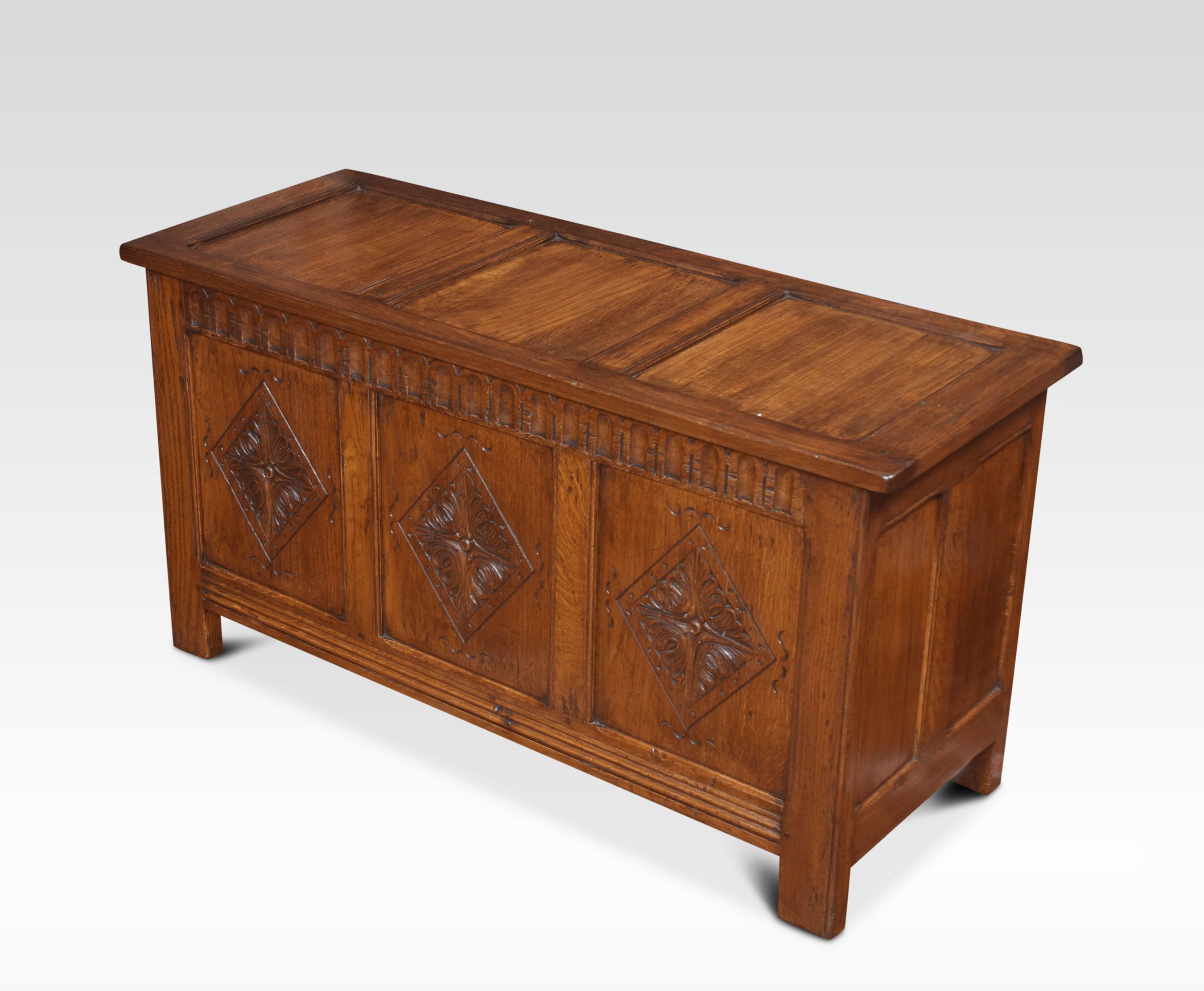 Oak coffer/blanket chest, the large rectangular hinged lid opening to reveal Lage storage facility. Above three carved panels. All raised up on stile feet.
Dimensions:
Height 22 inches
Width 42 inches
Depth 16 inches.