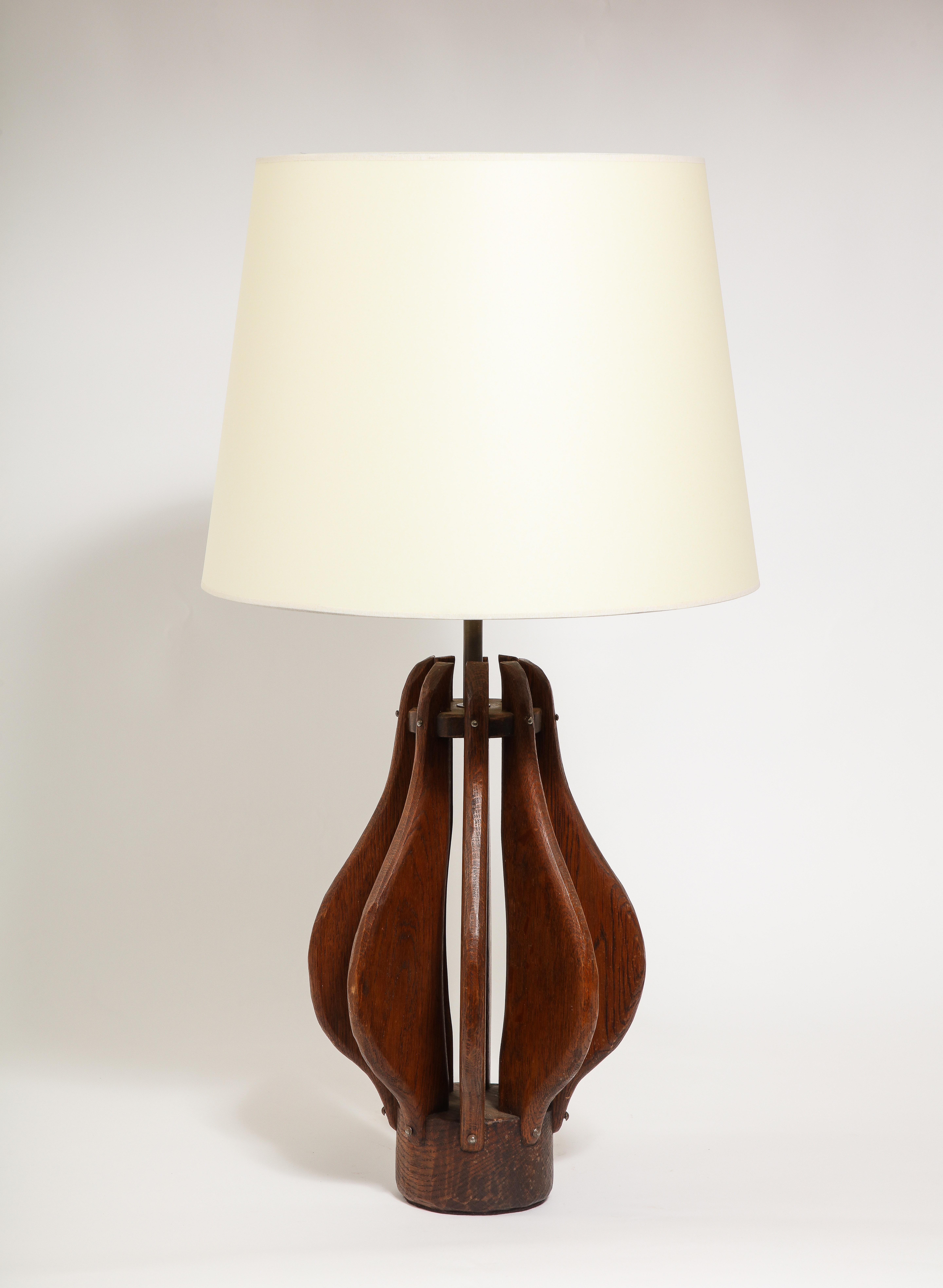 Brutalist table lamp in carved oak with wrought iron studs. Base only 22x11.

