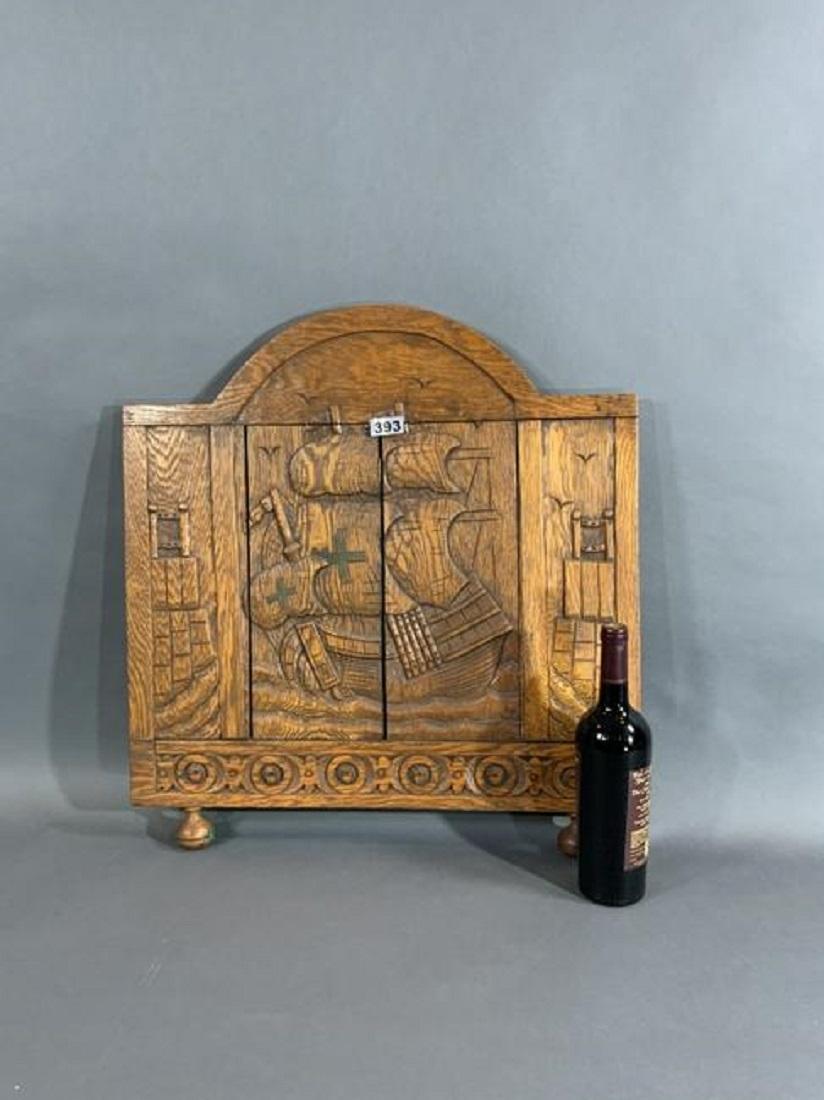 Interesting oak carving showing a sailing galleon under full sail. A fortress is shown on either side. High quality nautical antique.

Overall dimensions: Weight is 10 pounds. Dimensions: 26