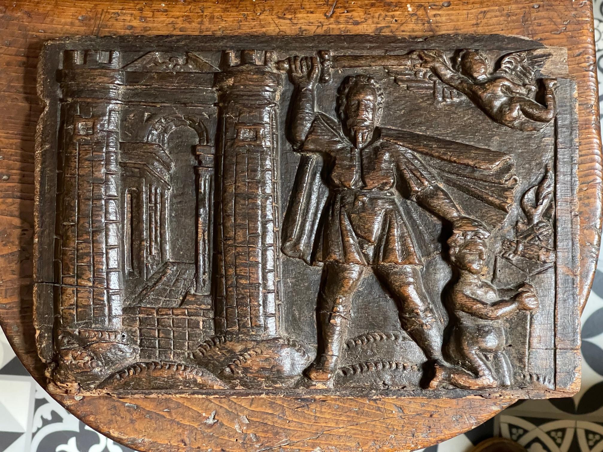 C1600. Oak carving of excellent colour and patination depicting Abraham’s sacrifice of Isaac with the angel holding back the sword.

size 32cms x 21
