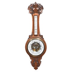 Antique Oak cased aneroid barometer