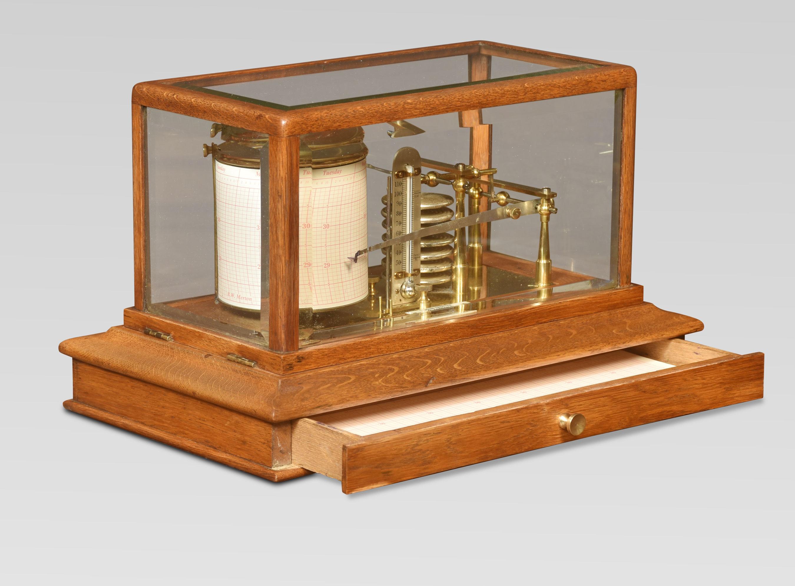 oak cased barograph and thermometer by John Trotter of Glasgow, having a hinged five-beveled glazed removable lid. The mechanical eight-day movement is housed in the drum, fitted with a seven-day chart that covers one full rotation of the drum. The