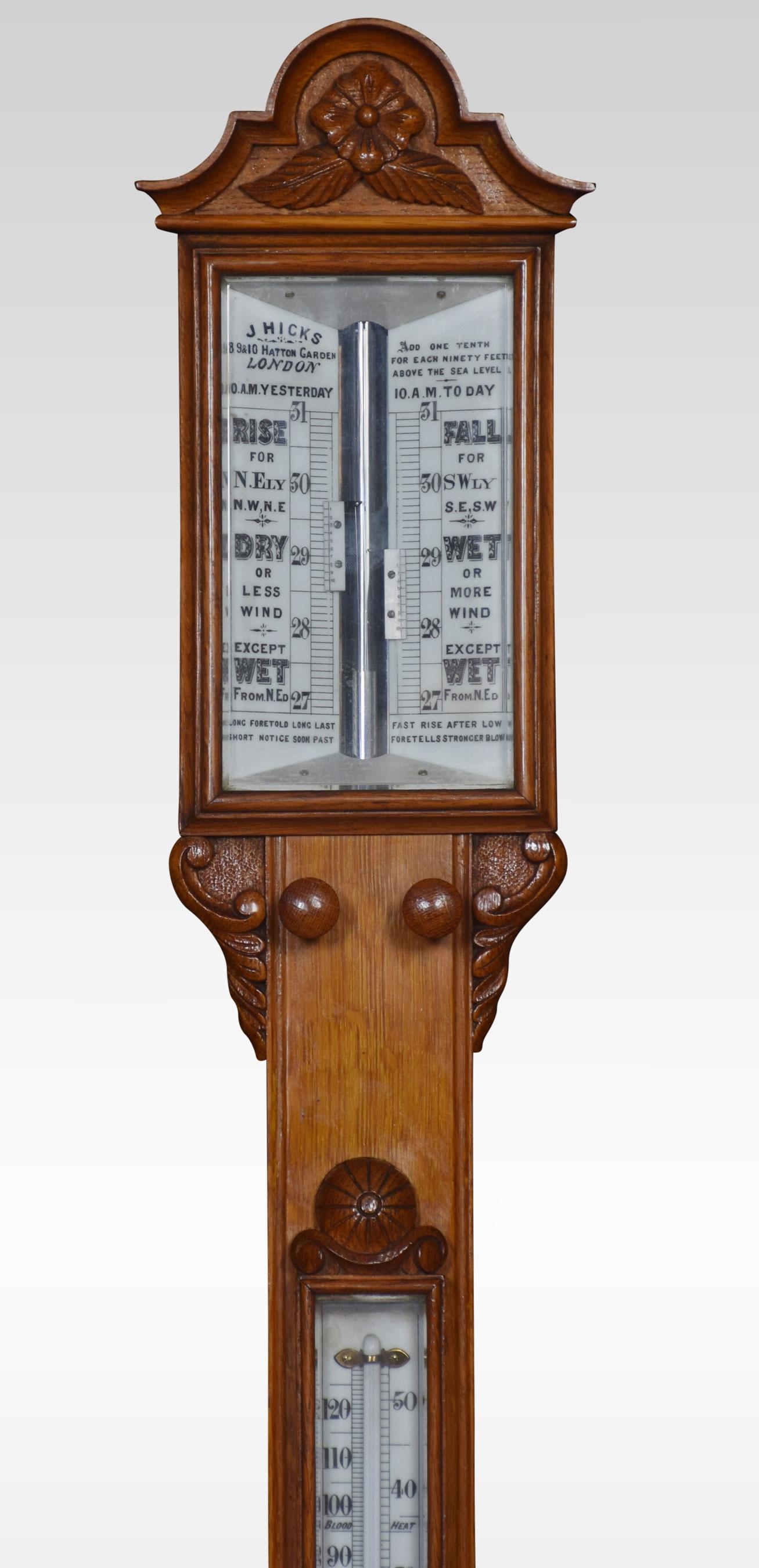 Late 19th century oak cased stick barometer and thermometer by J Hicks of London with engraved scales contained in oak case having shaped and moulded pediment, and carved cistern cover.
Dimensions:
Height 39.5 inches
Width 5.5 inches
Depth 3