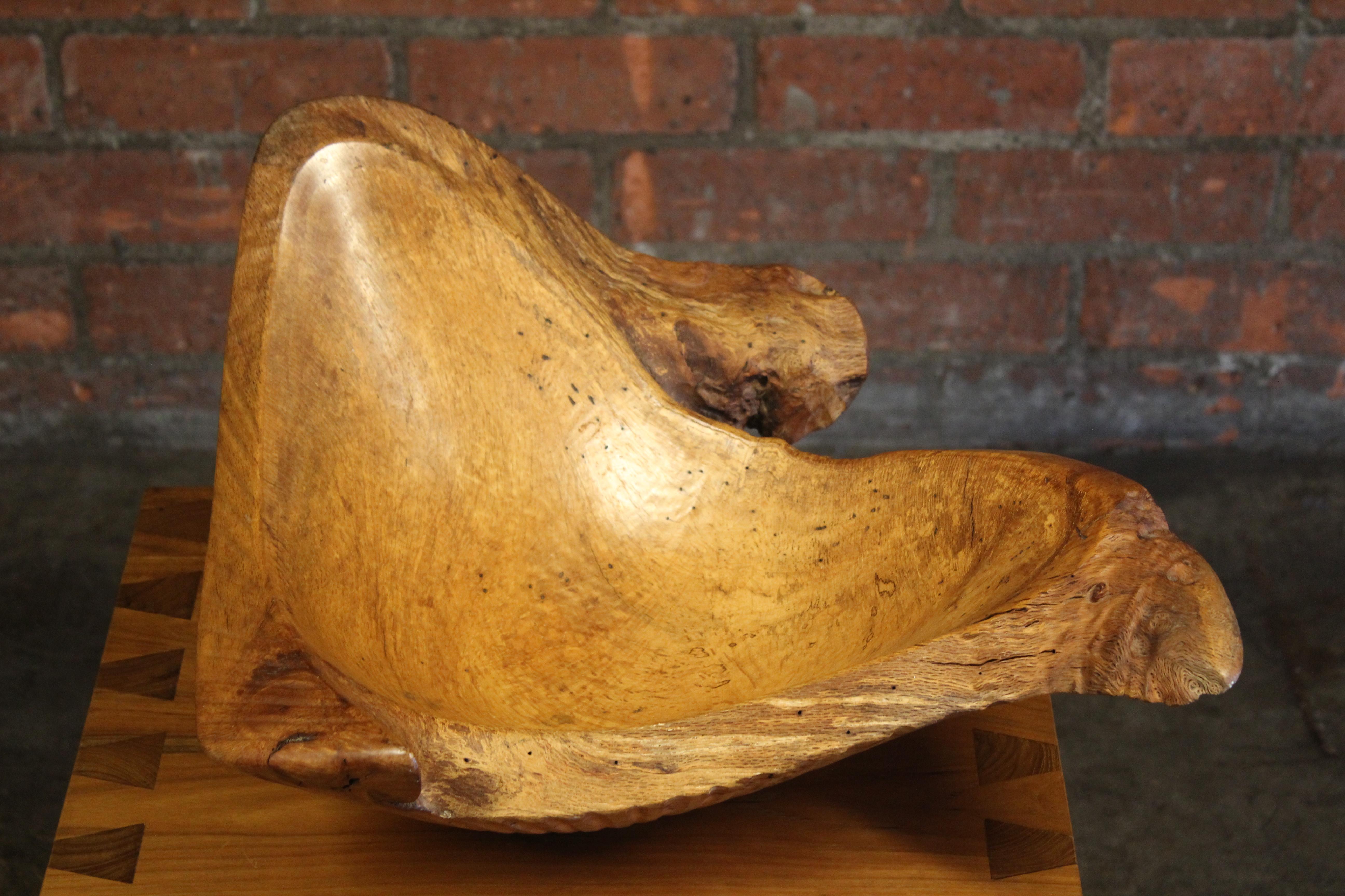 A beautiful oak wood centerpiece bowl that doubles as a work of art, by artist Bruce Mitchell, California, 1997.