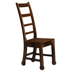 Silla de roble con ruedas, Inglaterra circa 1890