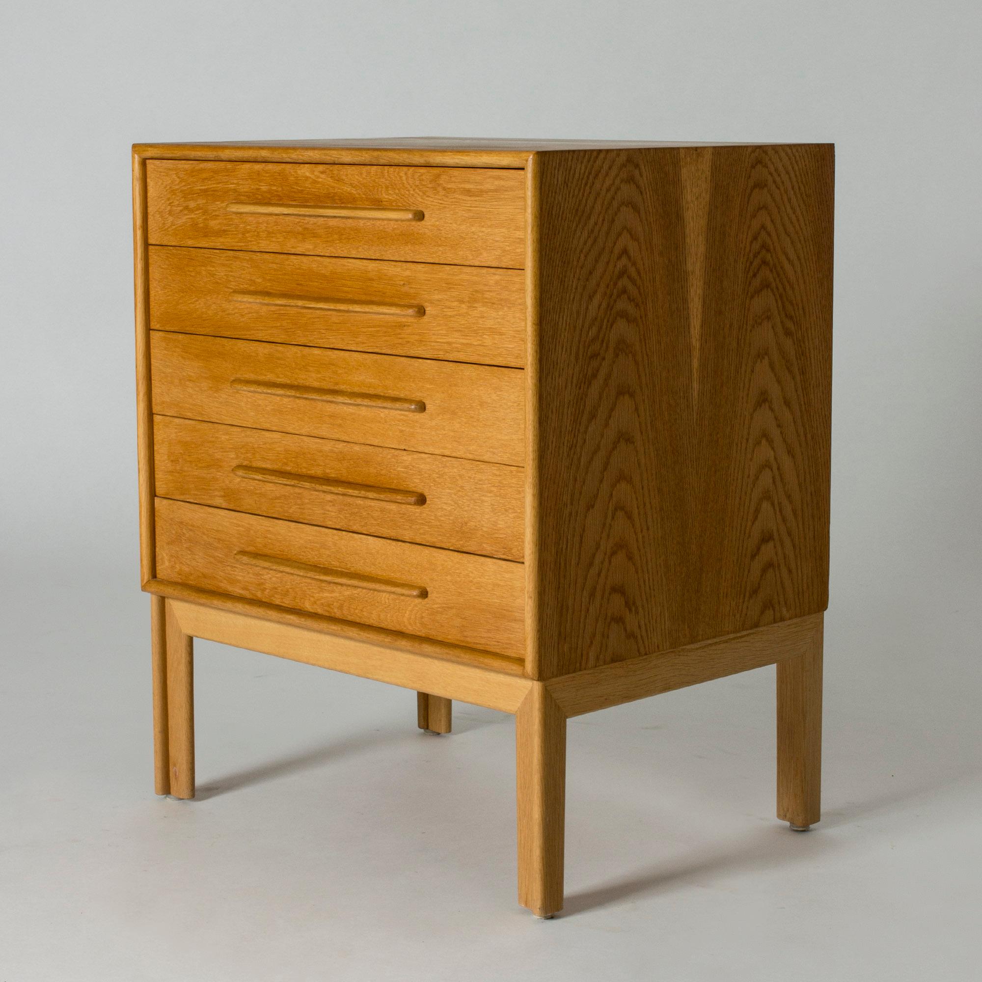 Chest of drawers by Alf Svensson, made from oak. Long, cool sculpted handles, neat size.
