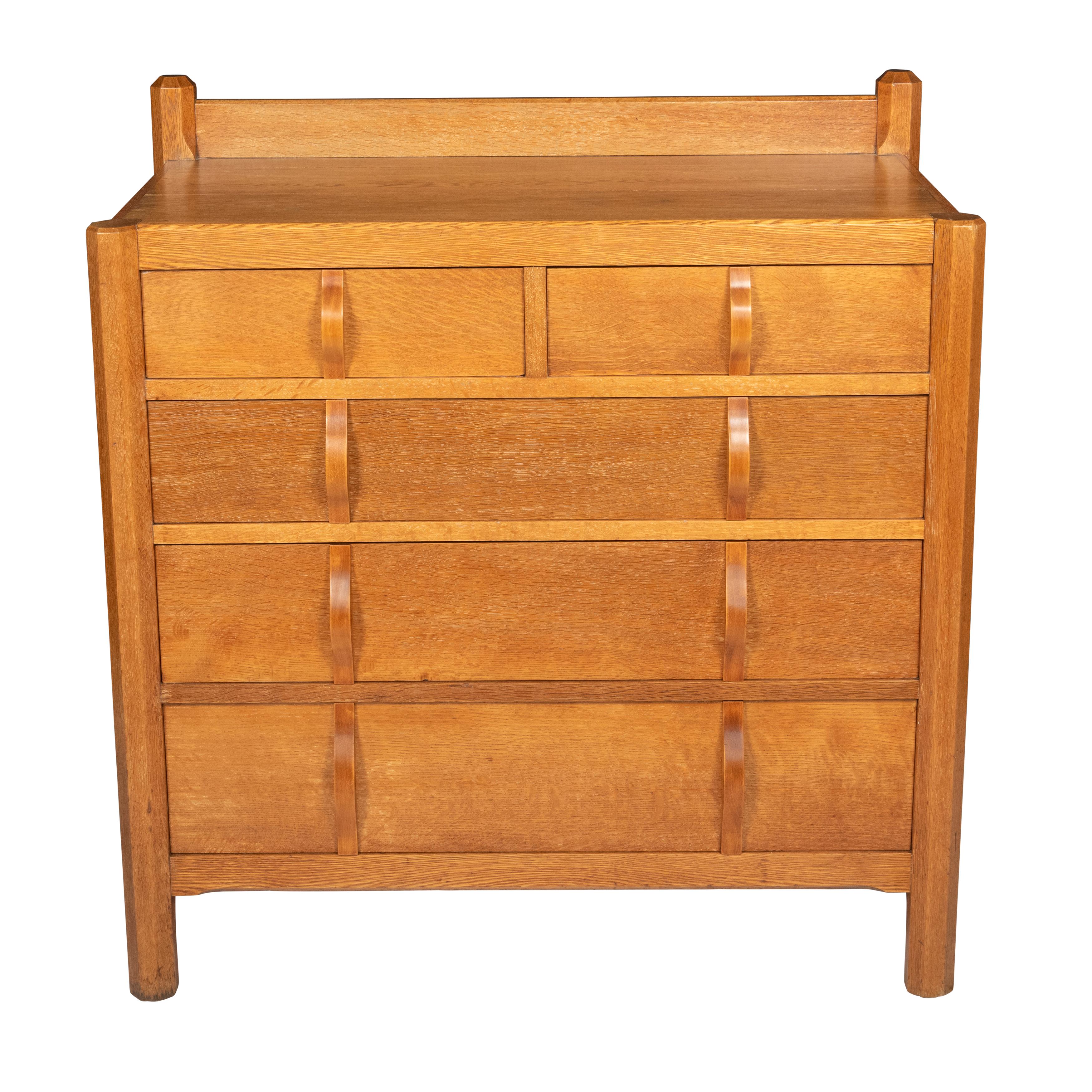 Rare and Early “Stow” Oak Chest of Drawers by Gordon Russell, England circa 1930
Oak D shaped handles.
105 cm high x 102 cm wide x 54 cm deep.