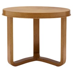 Oak Circular Side Table the Manner of Jacques Adnet.