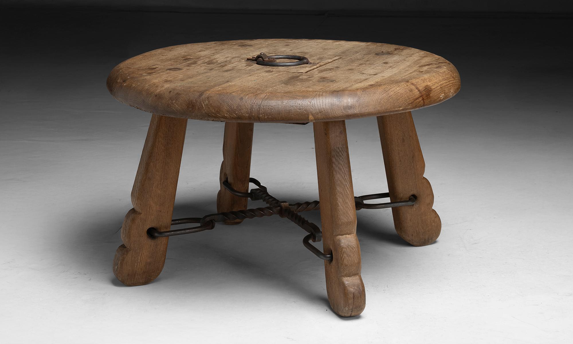 Belgium, 1960
Round oak coffee table on carved legs with iron hardware and secret storage.
35”dia x 21”h
Ref. TABLE1436
$ 4,800