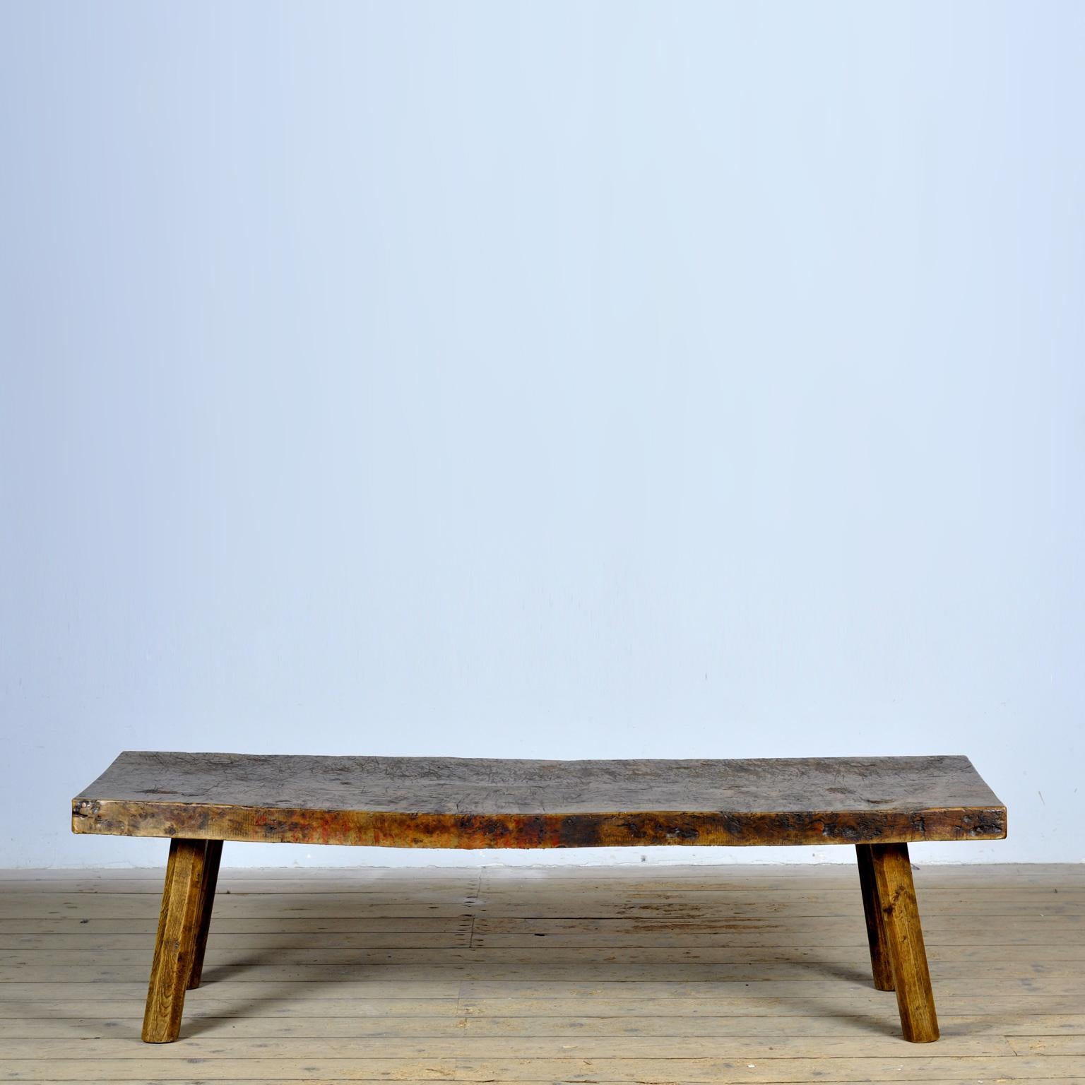 Butcher’s table from the 1930s, made of oak. With a beautifully weathered top of 7 cm thick that consists of one piece of wood. The legs are shortened to coffee table height. Treated against woodworm.