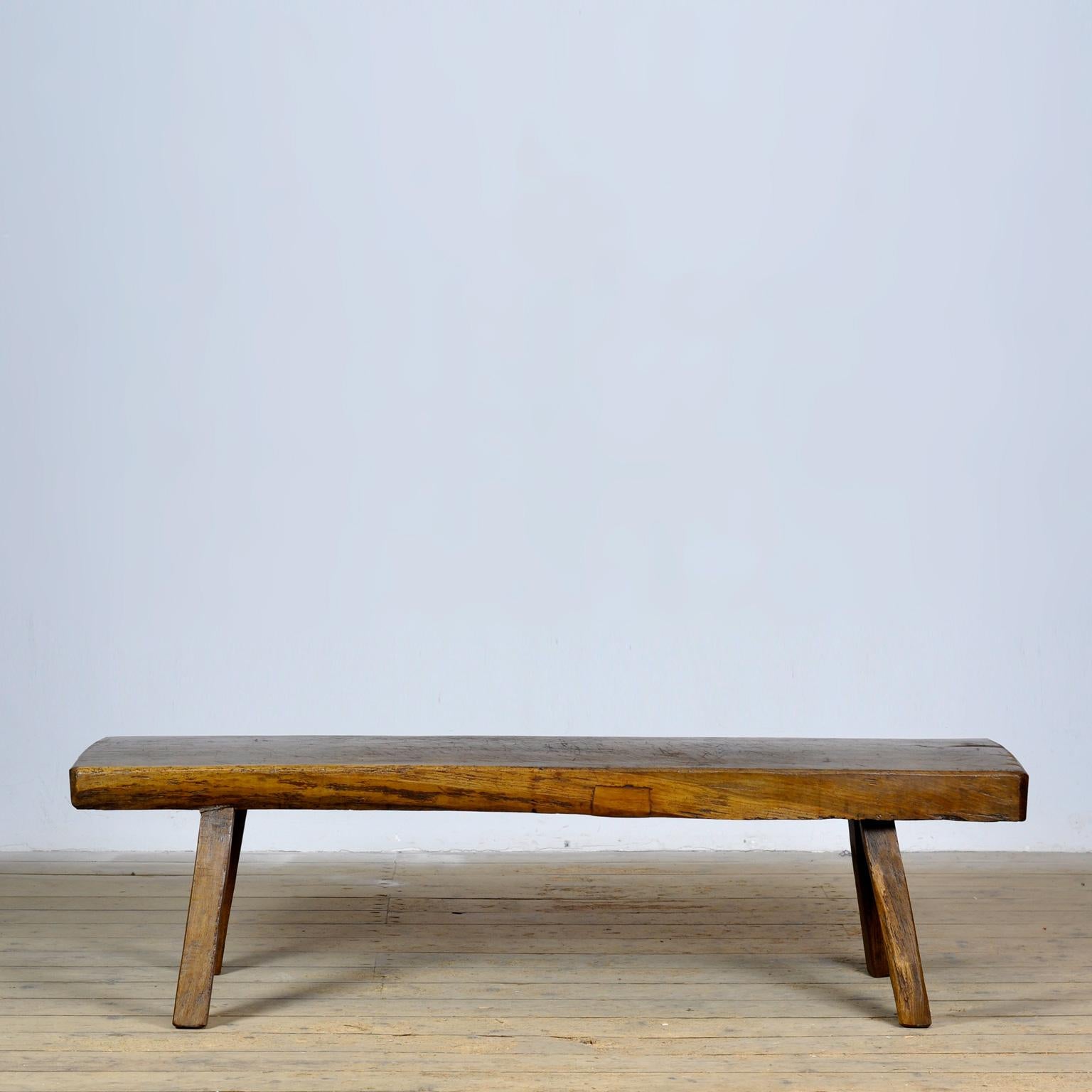 Butcher’s table from the 1930s, made of oak. With a beautifully weathered top of 10 cm thick that consists of one piece of wood. The legs are shortened to coffee table height. Treated against woodworm.