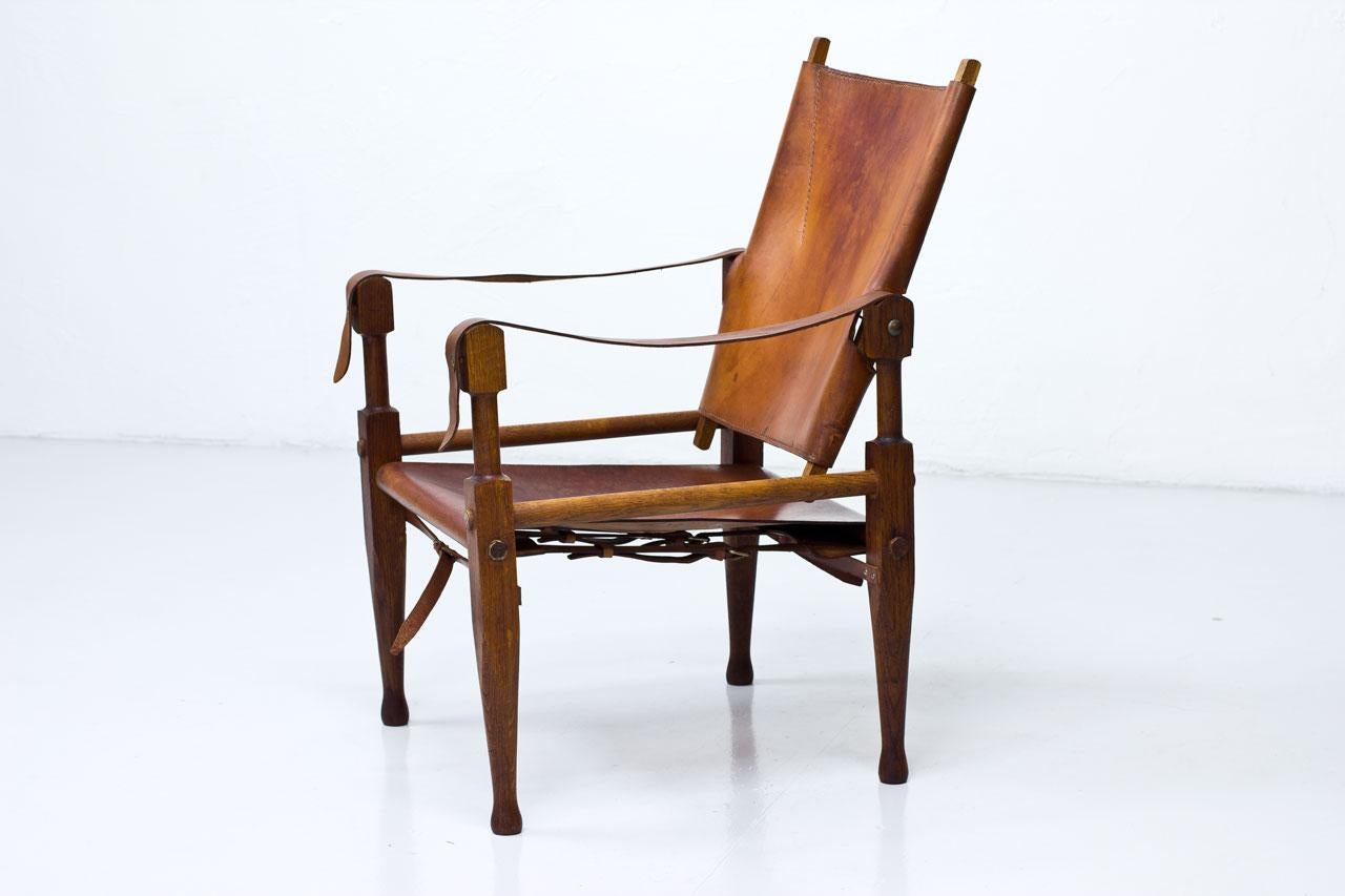 Swiss Oak and Cognac Leather Safari Chair by Wilhelm Kienzle for Wohnbedarf, 1950s