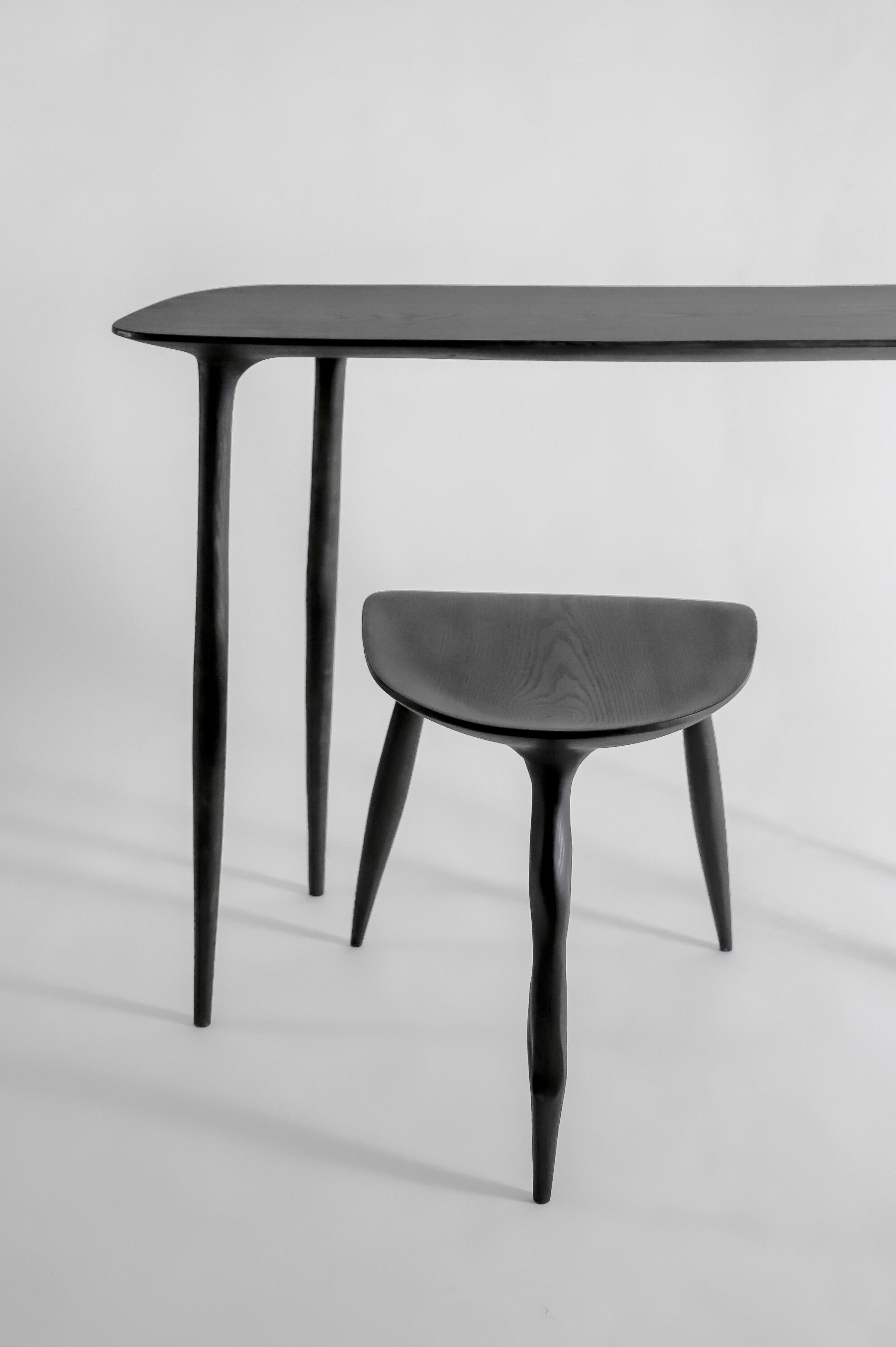 Oak console desk with stool, hand-sculpted by Cedric Breisacher
Dimension: H 80 cm x P 35 cm x L 110 cm
Butterfly oak stool: 45 x 41 x 42 cm

BTRFL console is carved by nature itself. The top is cuted following the
wood lines making each piece
