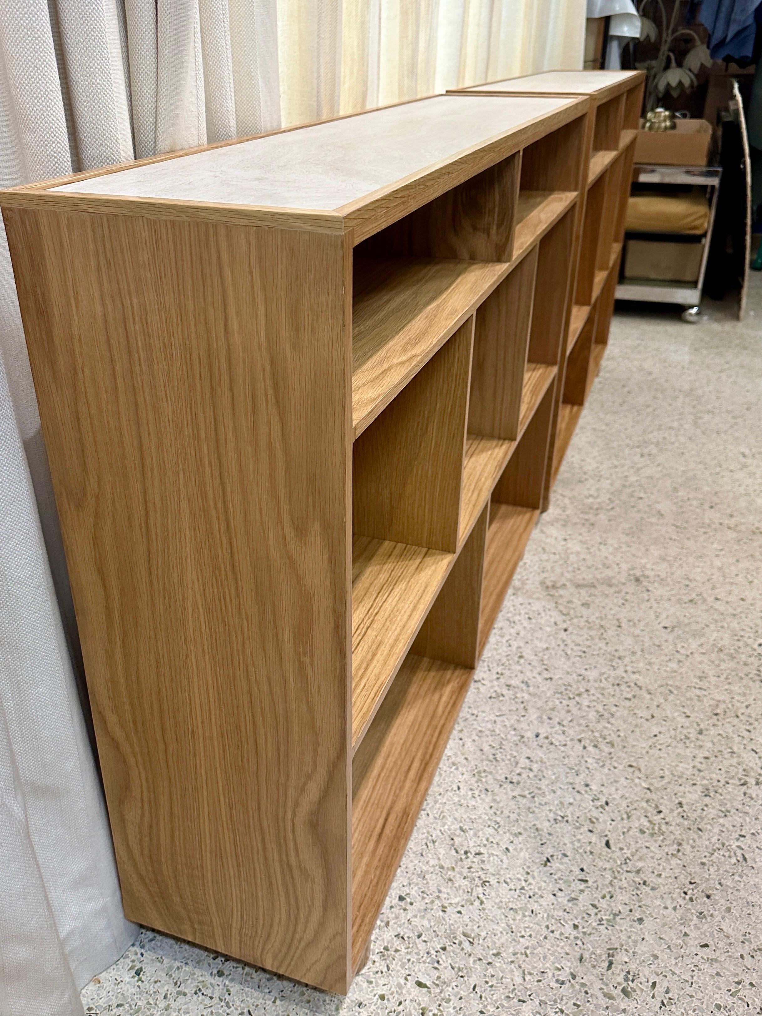 This is a wonderful pair of low console height bookcases in solid oak and porcelain top in natural stone finish.  These are sold separately but make a great pair if you need.  ONLY two available.