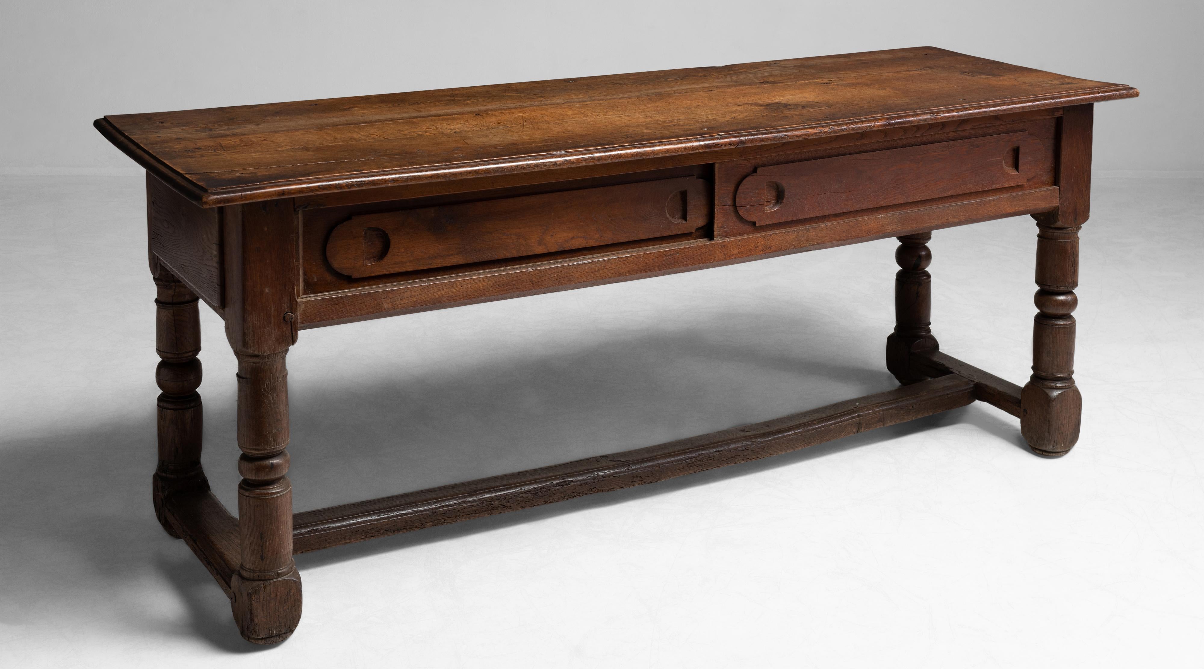 Oak console table, France, circa 1800

Unique console with two sliding doors and room for storage.

Measures: 78