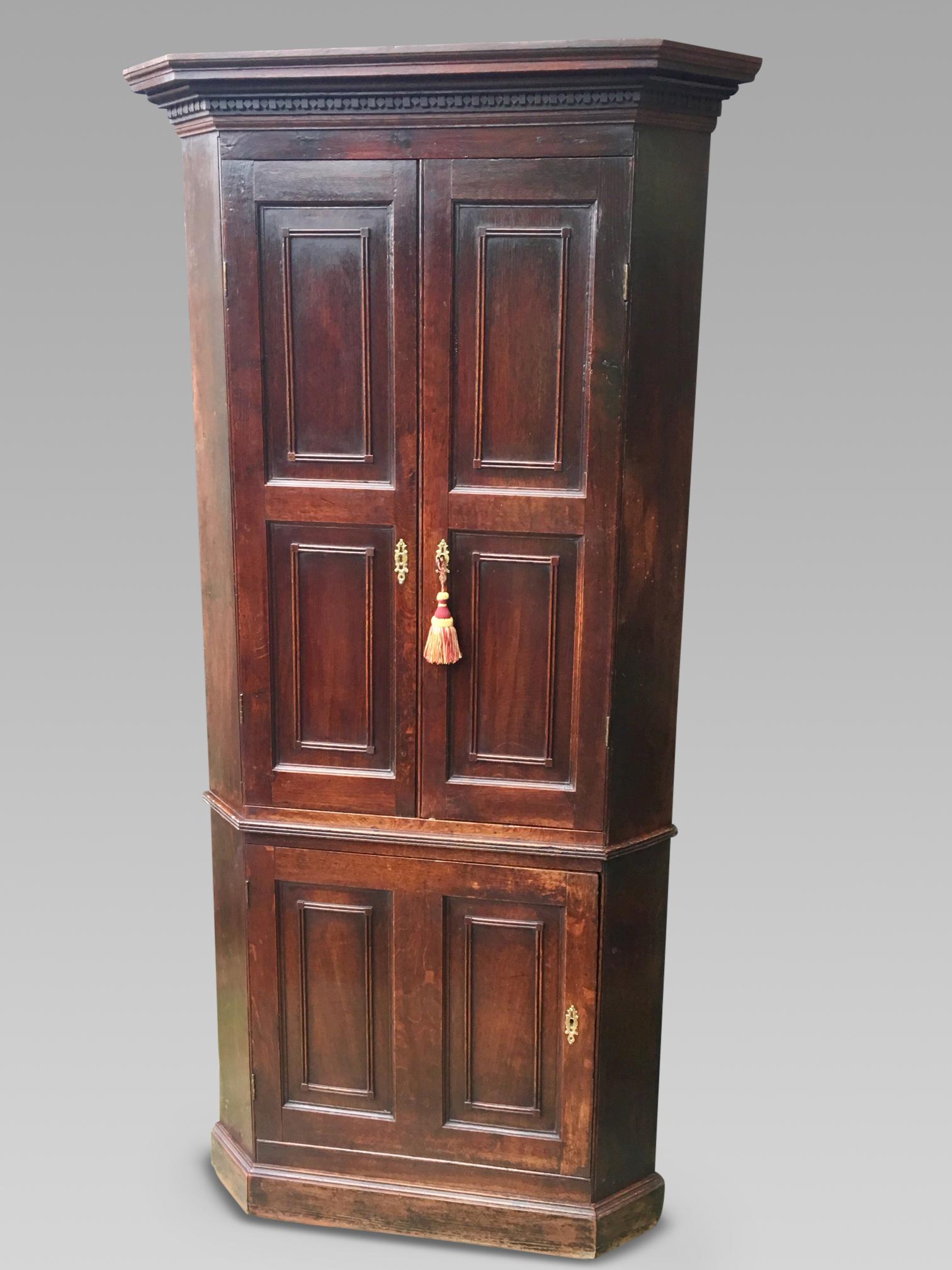 Good quality one piece Oak corner cabinet. English, circa 1820
This cabinet has a good all round colour and patina. We have checked 
over and refurbished this piece and finally wax polished it.
There is plenty of storage space. The back boards
