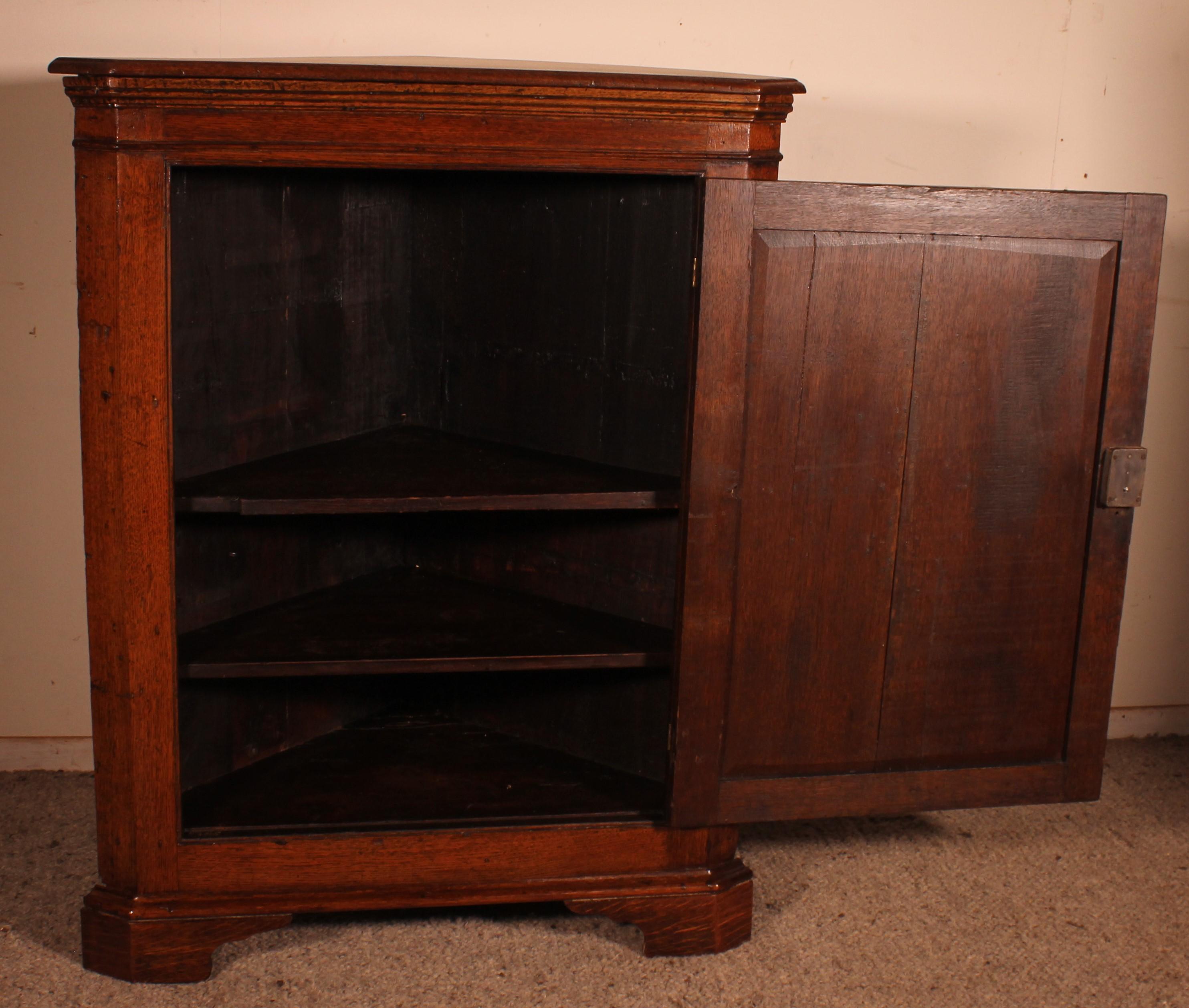 British Oak Corner Cupboard Circa 1800 For Sale