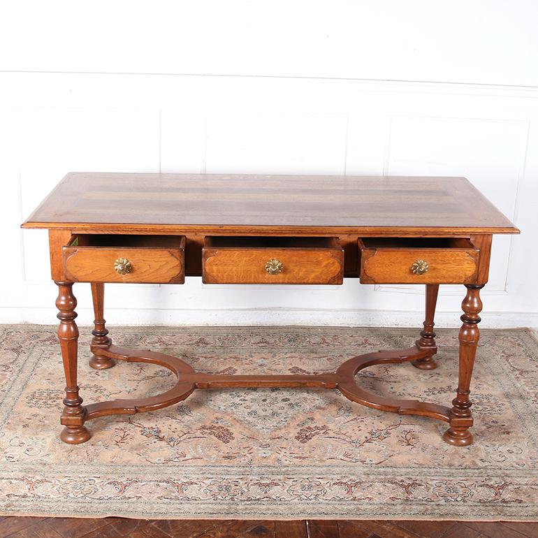 Late 19th Century Oak Centre Table with three drawers.

Dimensions: 60″ wide by 29″ deep by 30″ tall